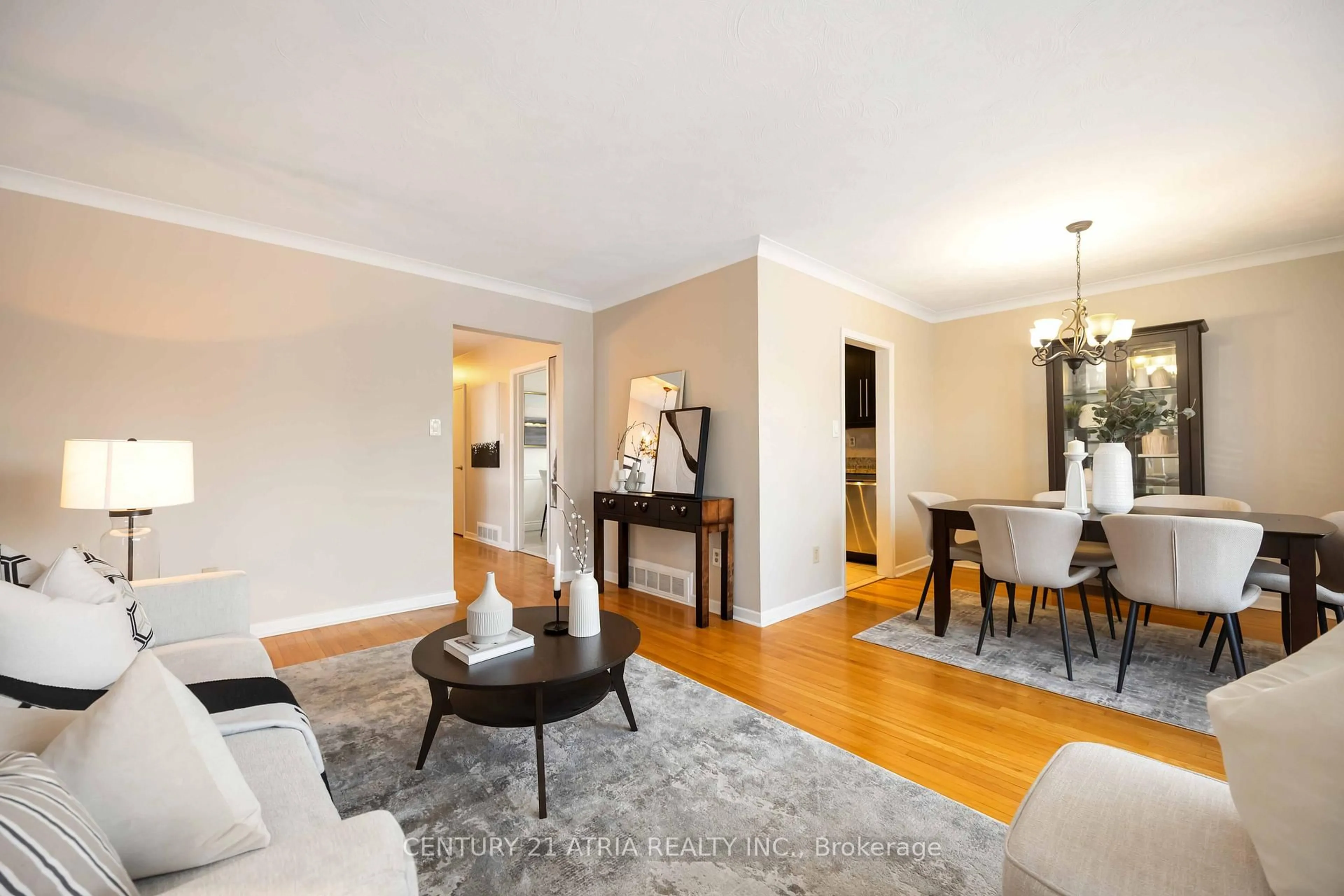 Living room with furniture, wood/laminate floor for 33 Amberdale Dr, Toronto Ontario M1P 4B9