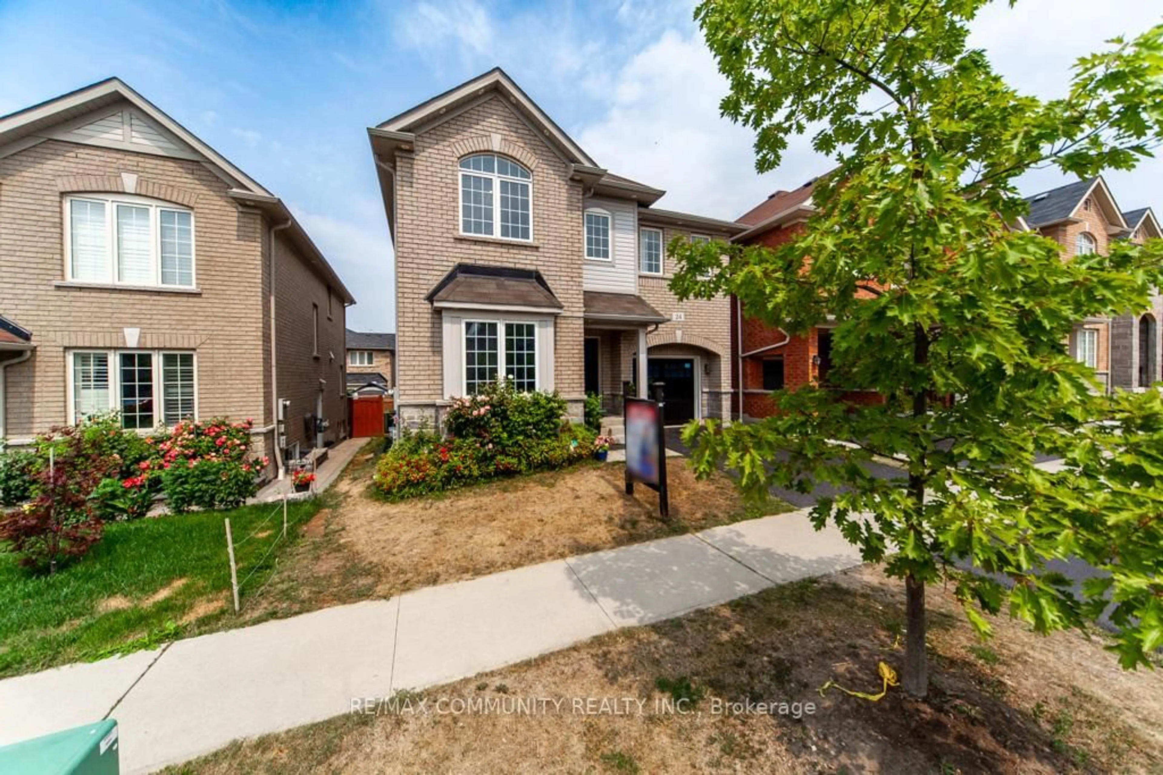 Home with brick exterior material, street for 24 Raithby Cres, Ajax Ontario L1Z 0S6