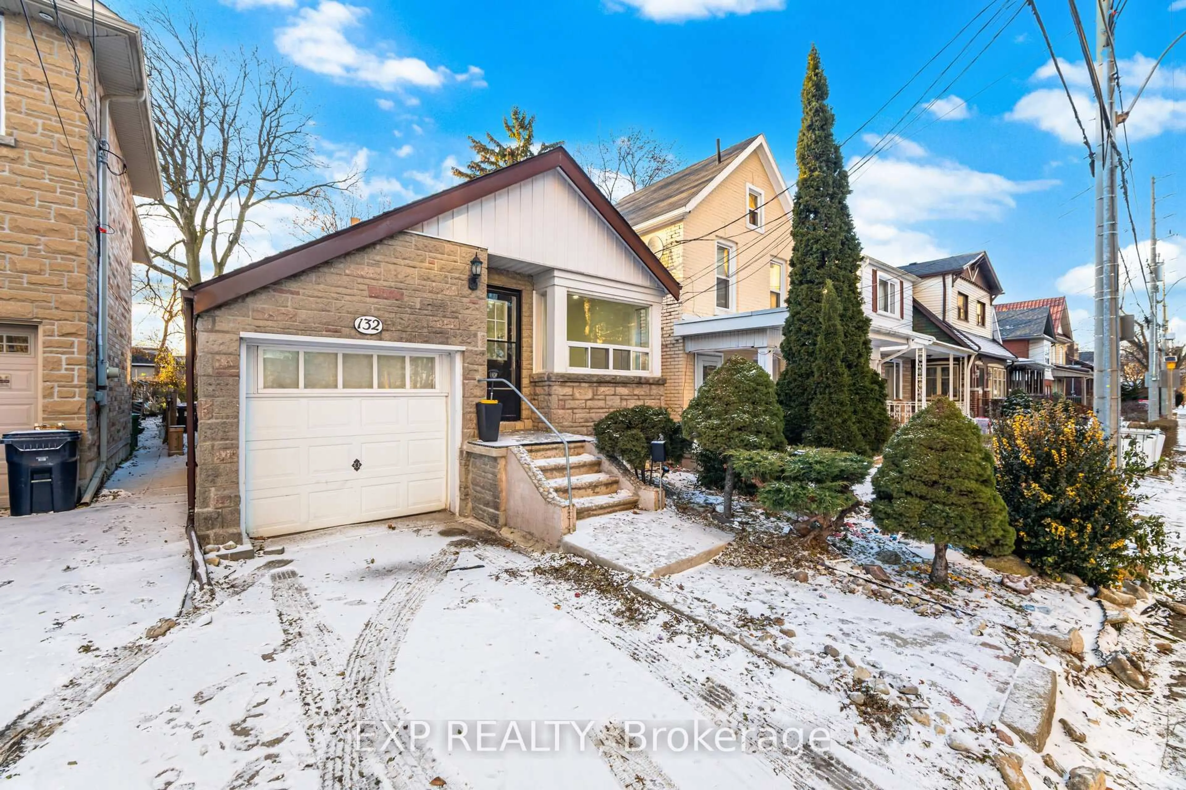 Home with brick exterior material, street for 132 Barrington Ave, Toronto Ontario M4C 4Z2