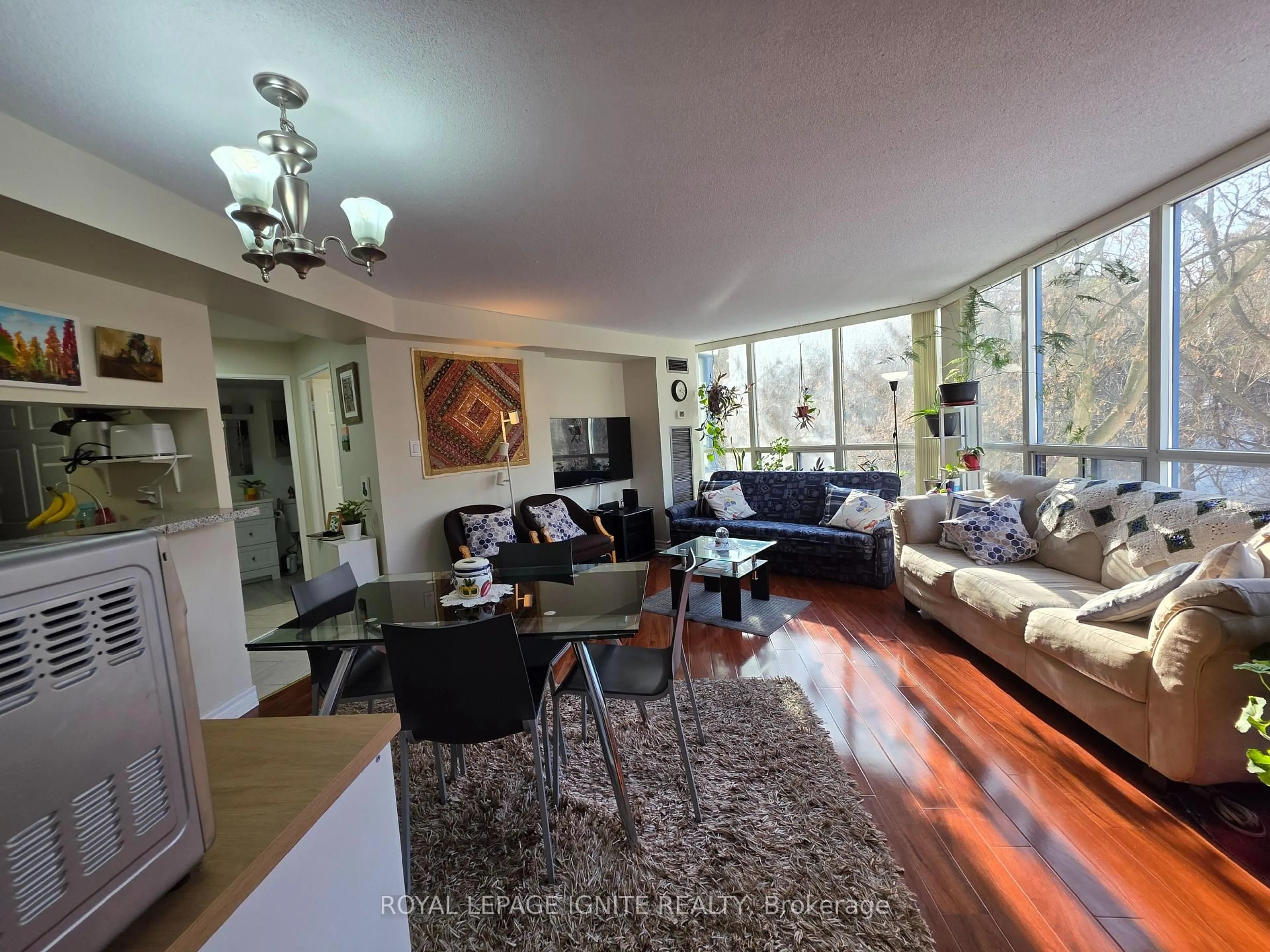 Living room with furniture, unknown for 3050 Ellesmere Rd #312, Toronto Ontario M1E 5E6