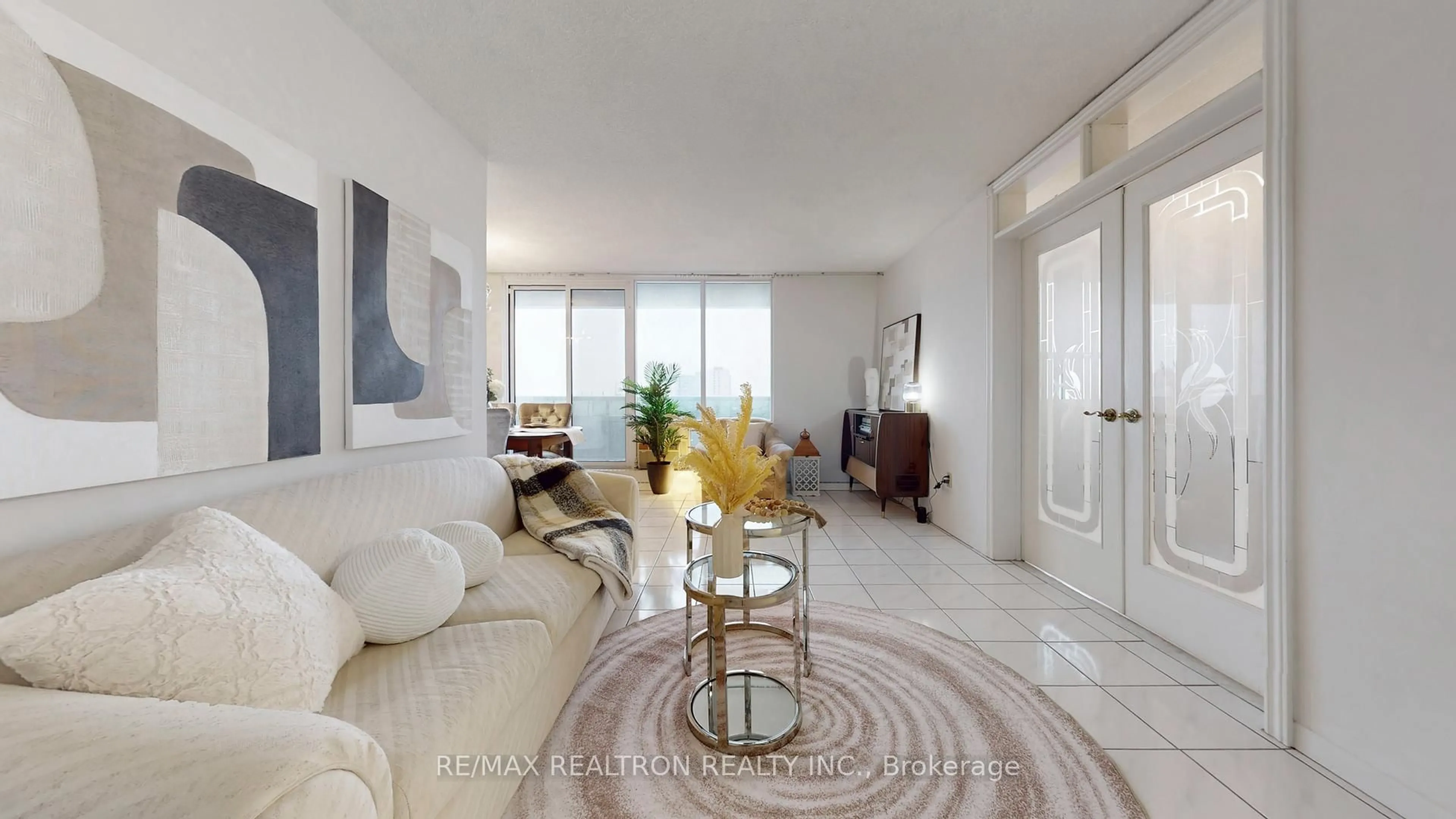 Living room with furniture, ceramic/tile floor for 1250 Bridletowne Circ #PH05, Toronto Ontario M1W 2V1