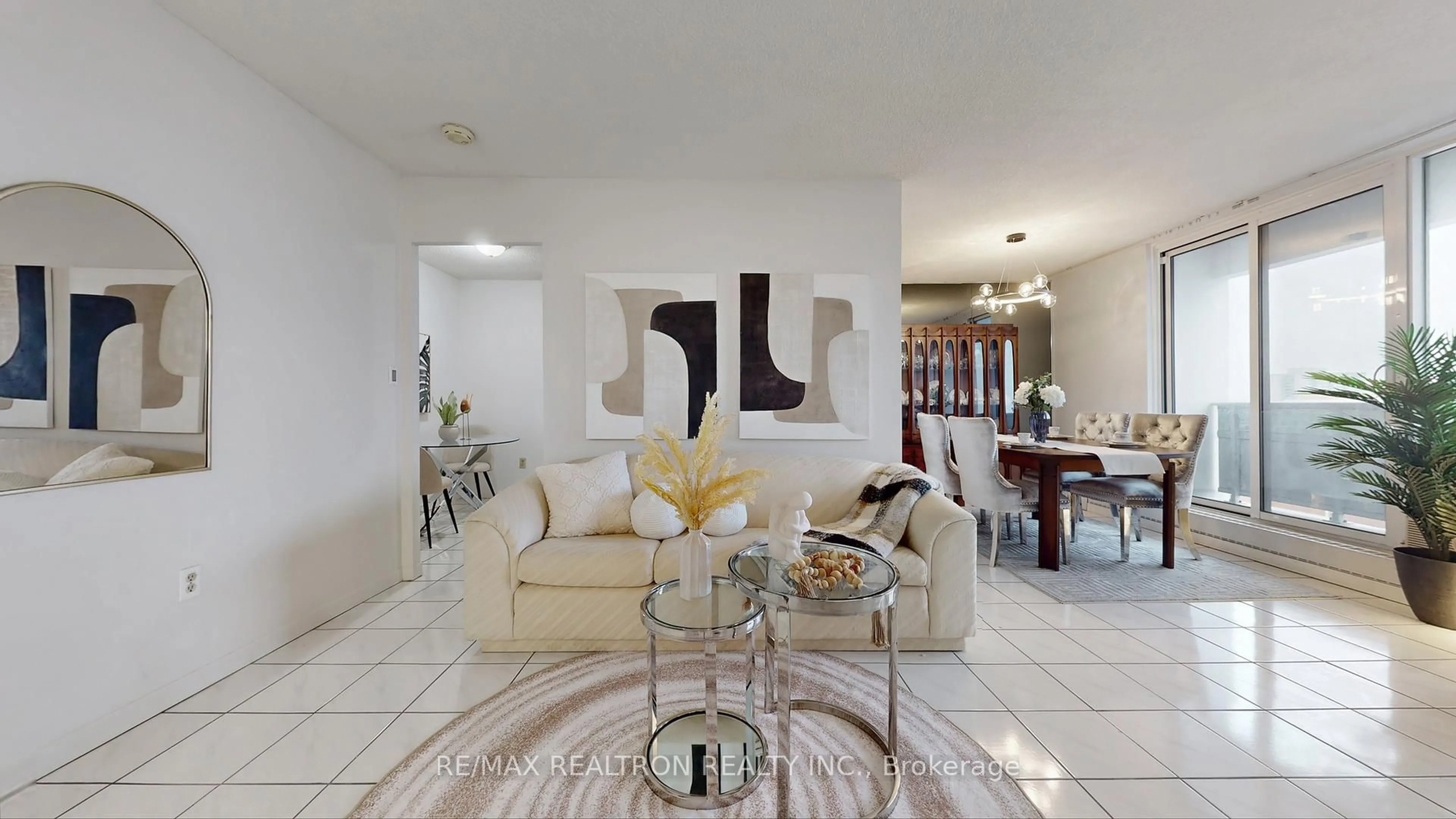 Living room with furniture, ceramic/tile floor for 1250 Bridletowne Circ #PH05, Toronto Ontario M1W 2V1