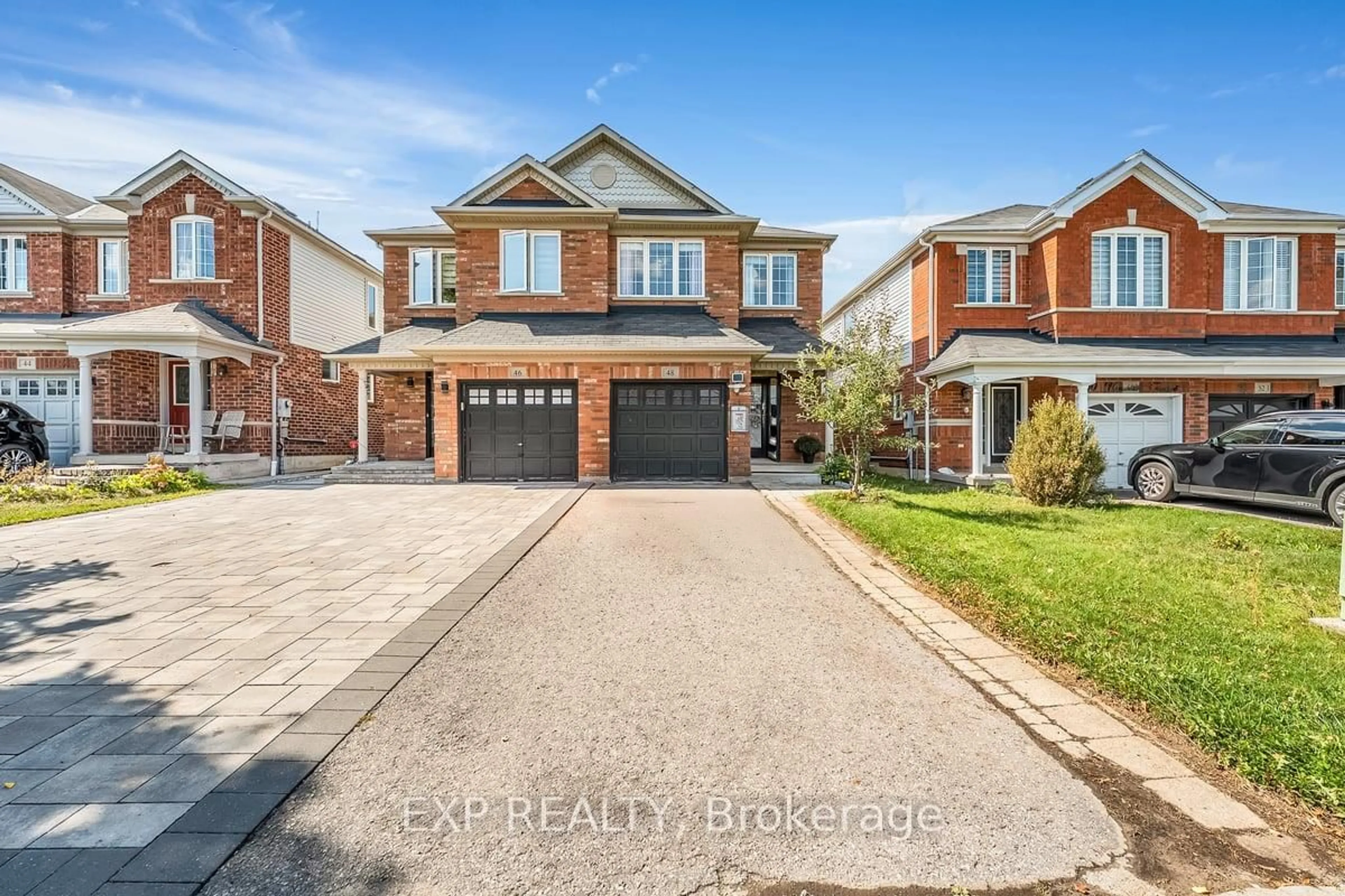 Home with brick exterior material, street for 48 Unsworth Cres, Ajax Ontario L1T 4X3