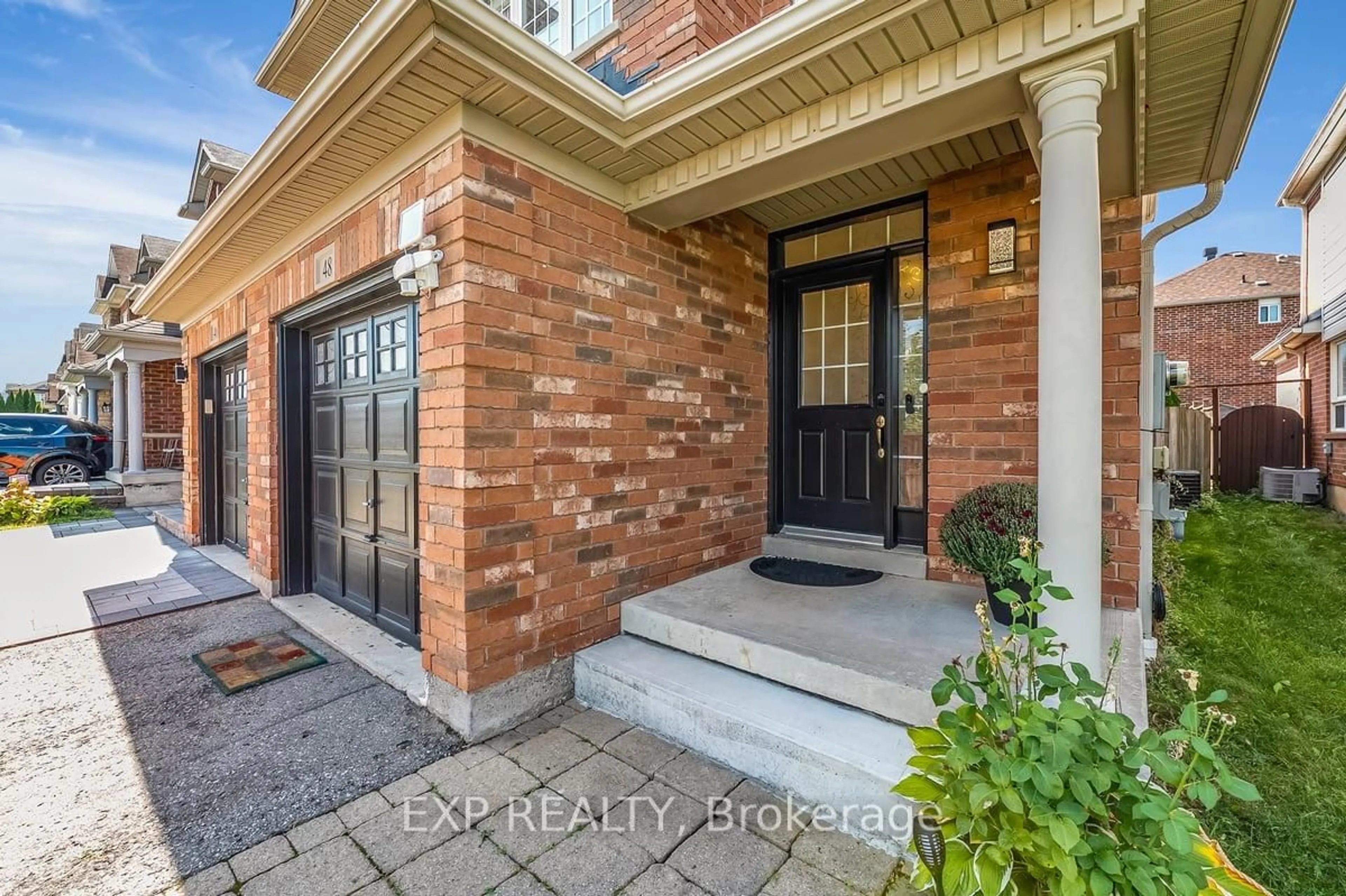 Home with brick exterior material, street for 48 Unsworth Cres, Ajax Ontario L1T 4X3