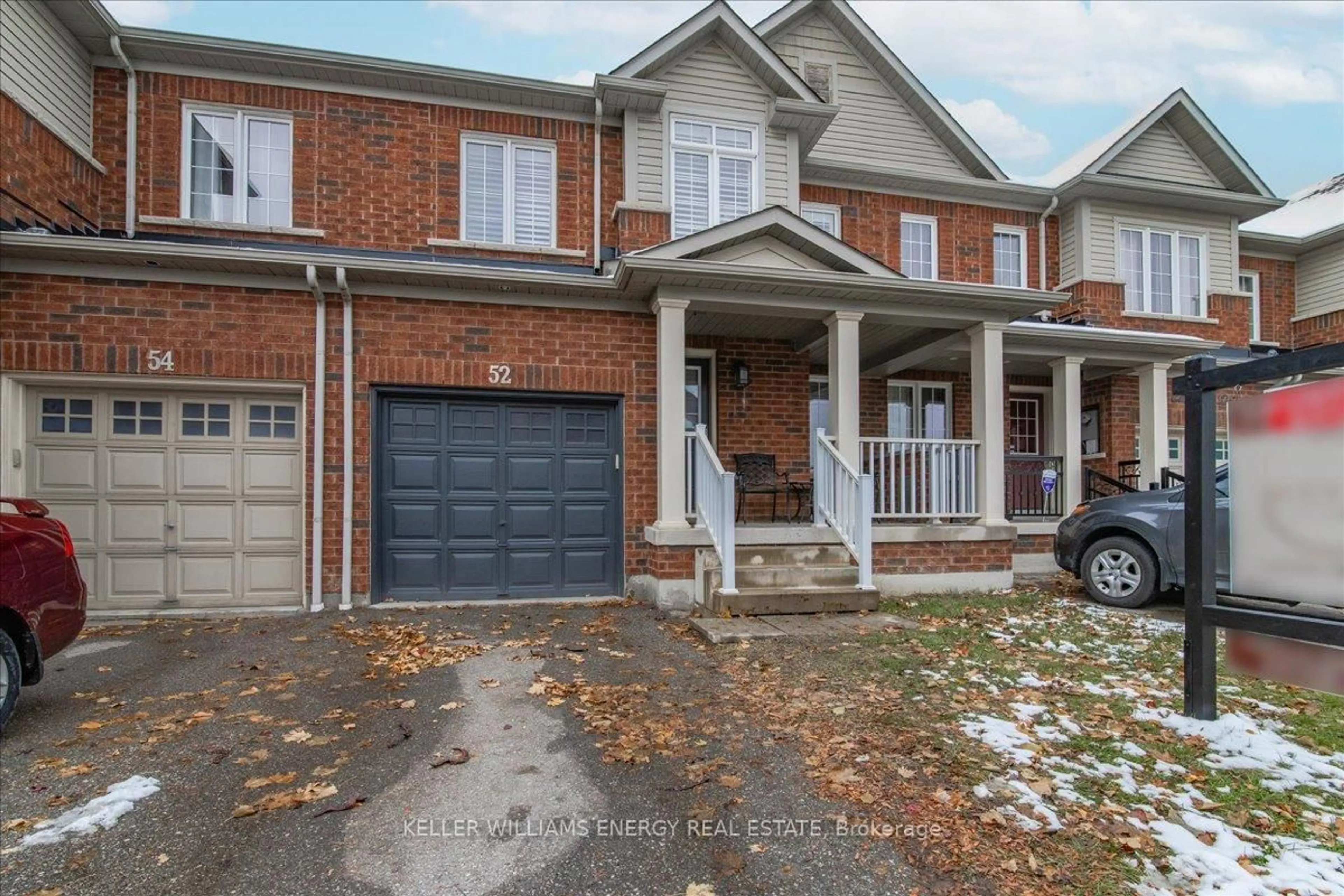 Home with brick exterior material, street for 52 Elliottglen Dr, Ajax Ontario L1Z 0H2