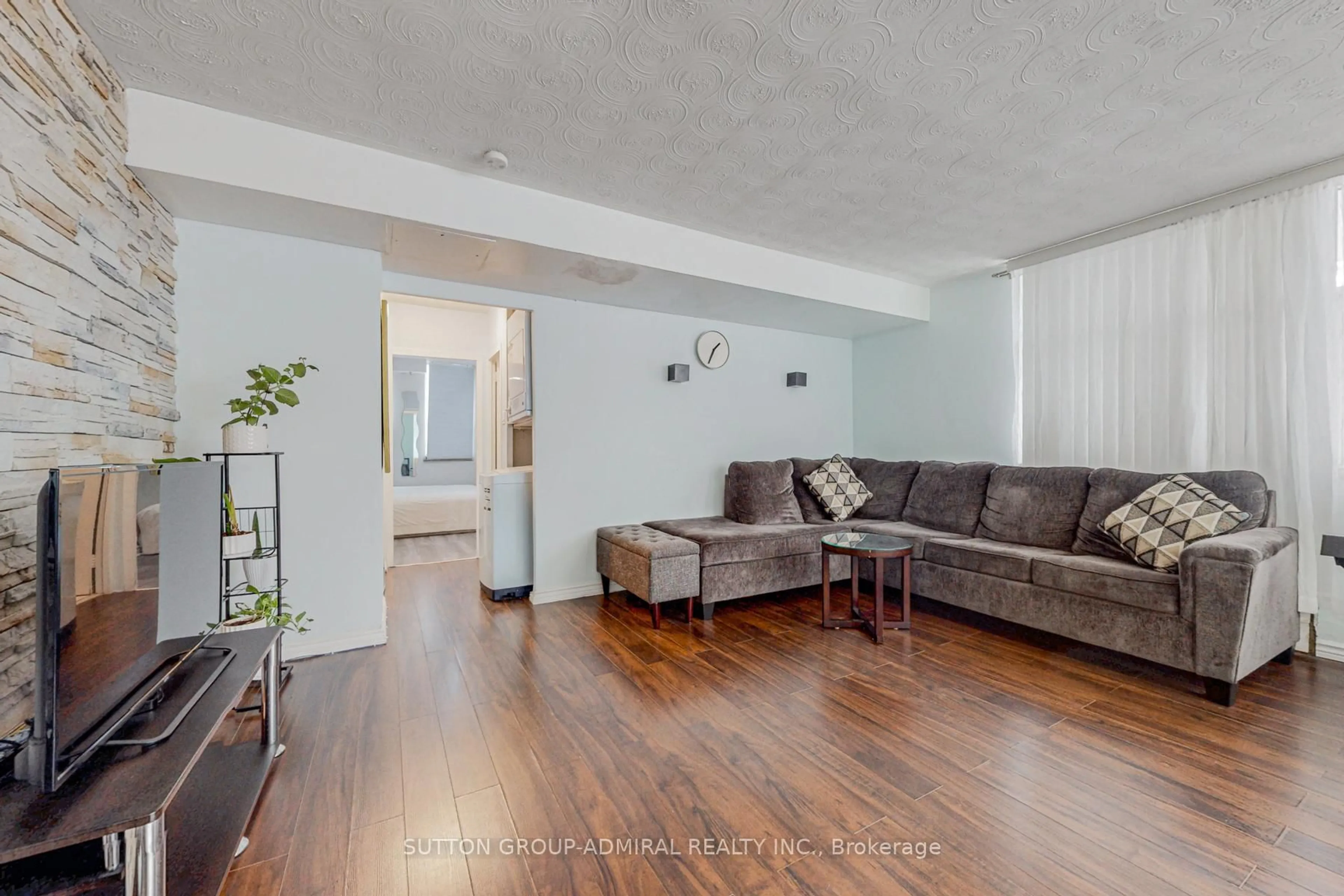 Living room with furniture, unknown for 2245 Eglinton Ave #209, Toronto Ontario M1K 2N3