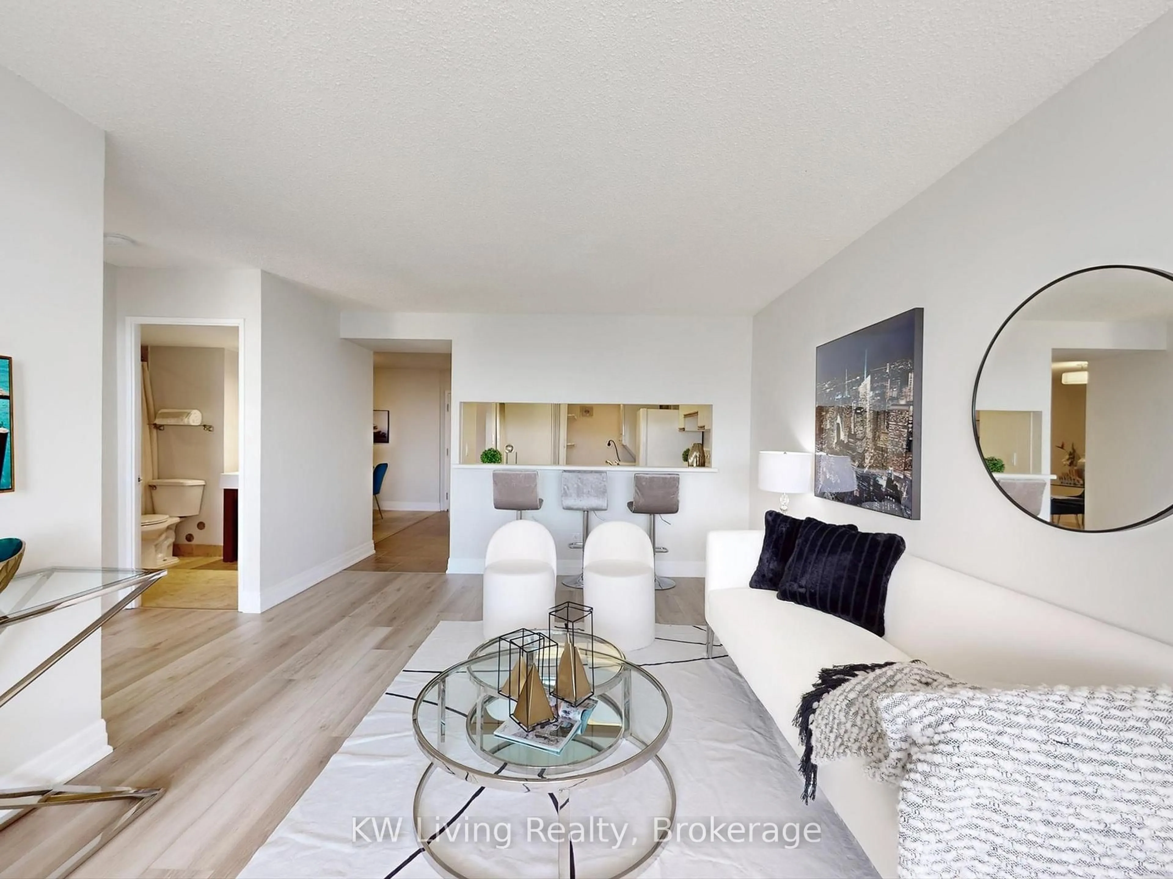 Living room with furniture, wood/laminate floor for 225 Bamburgh Circ #1912, Toronto Ontario M1W 3X9