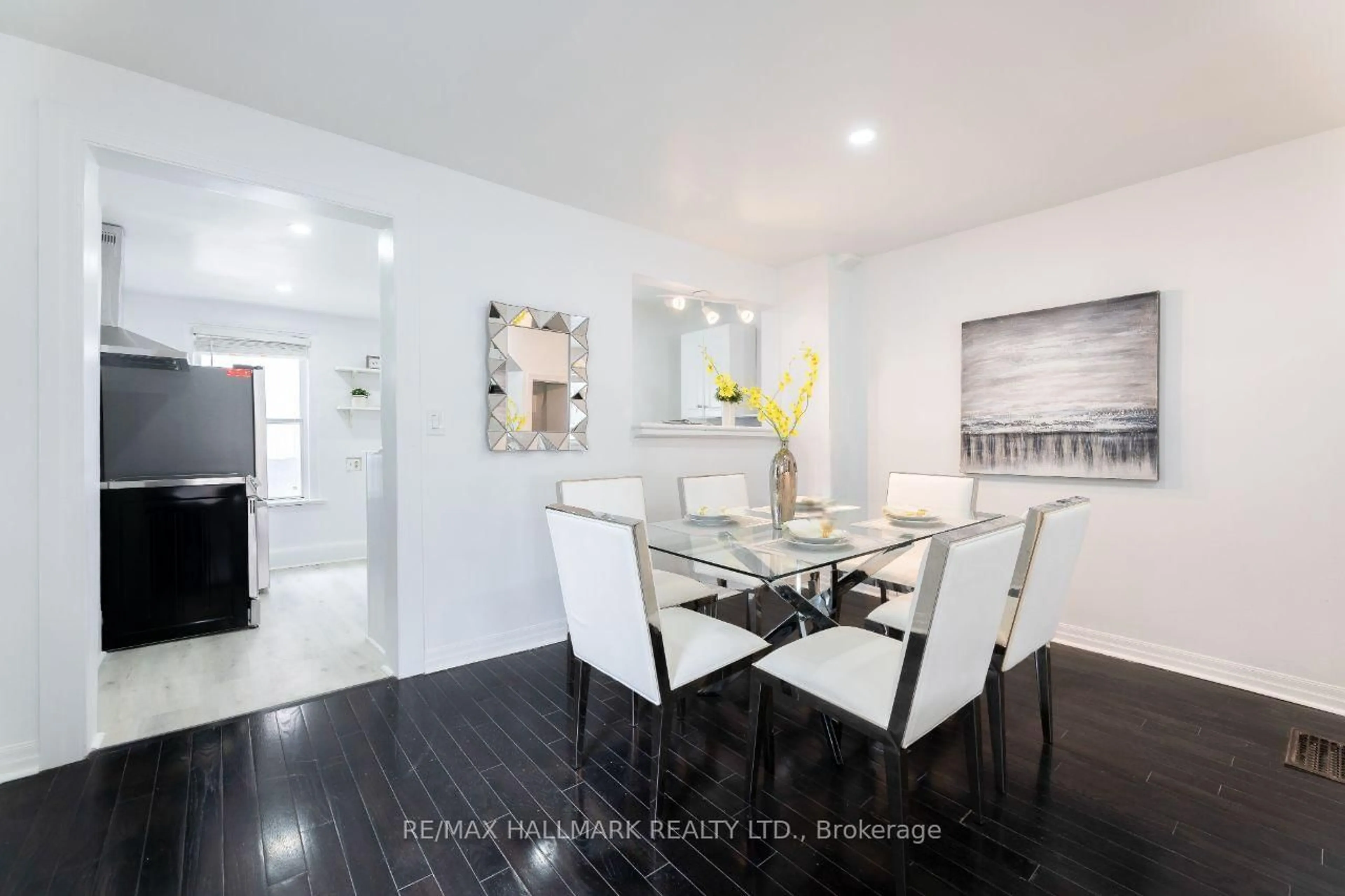 Dining room, wood/laminate floor for 106 Willow Ave, Toronto Ontario M4E 3K3