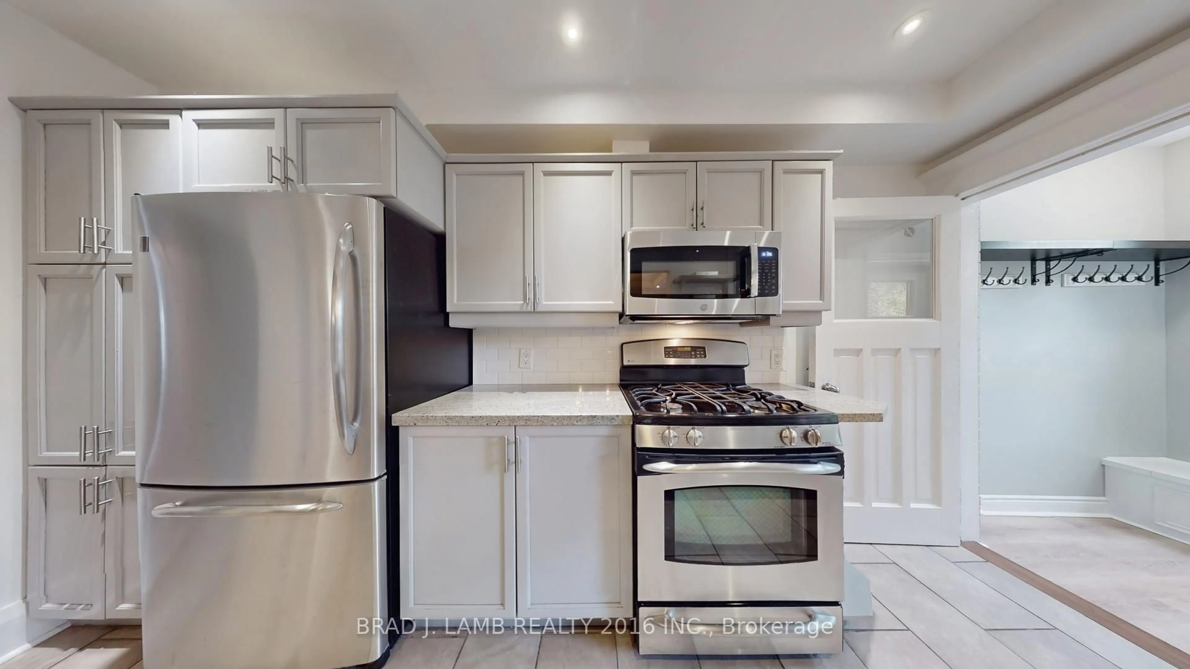 Standard kitchen, ceramic/tile floor for 107 Woodbine Ave, Toronto Ontario M4L 3P1