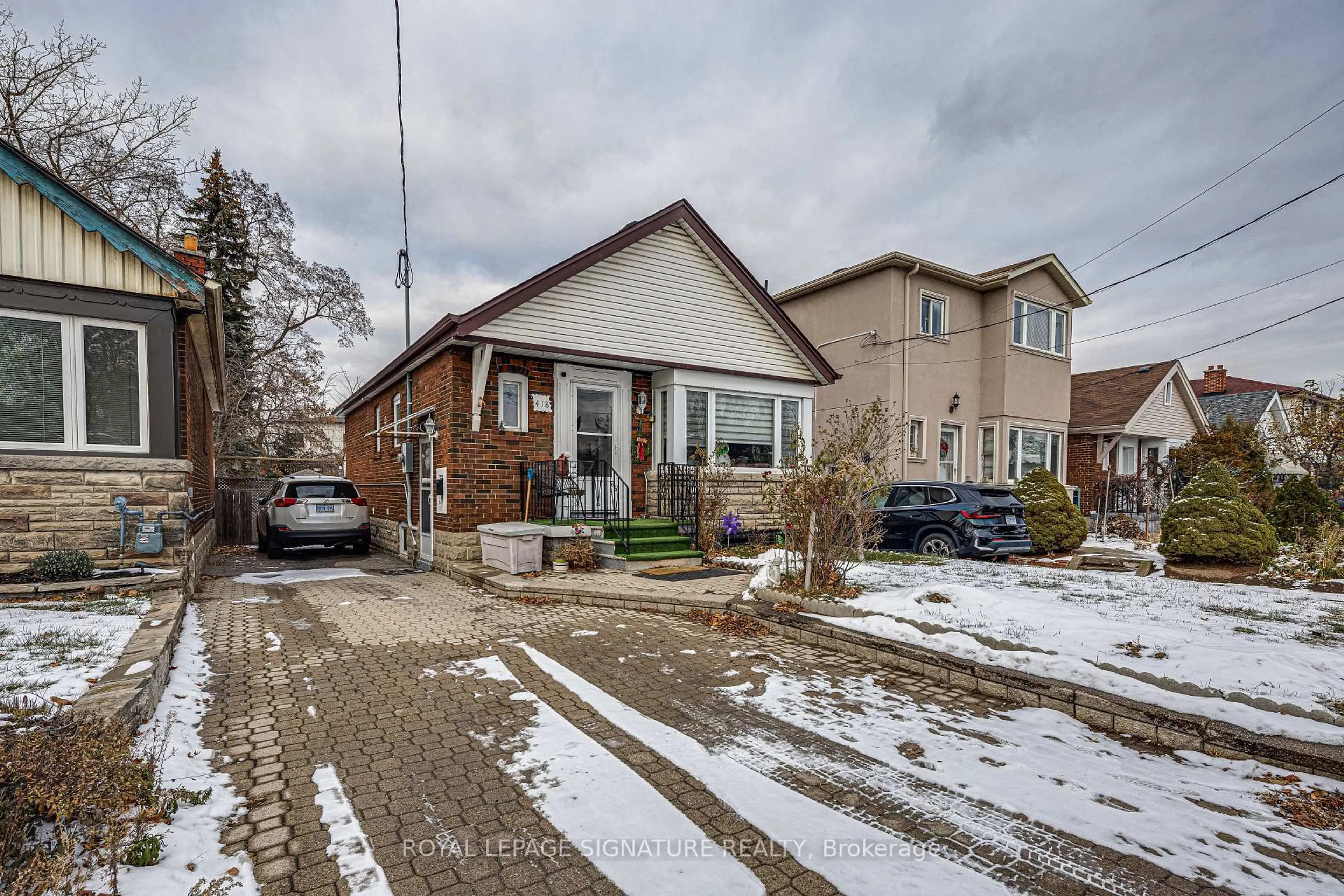 Home with brick exterior material, street for 418 O' Connor Dr, Toronto Ontario M4J 2W3