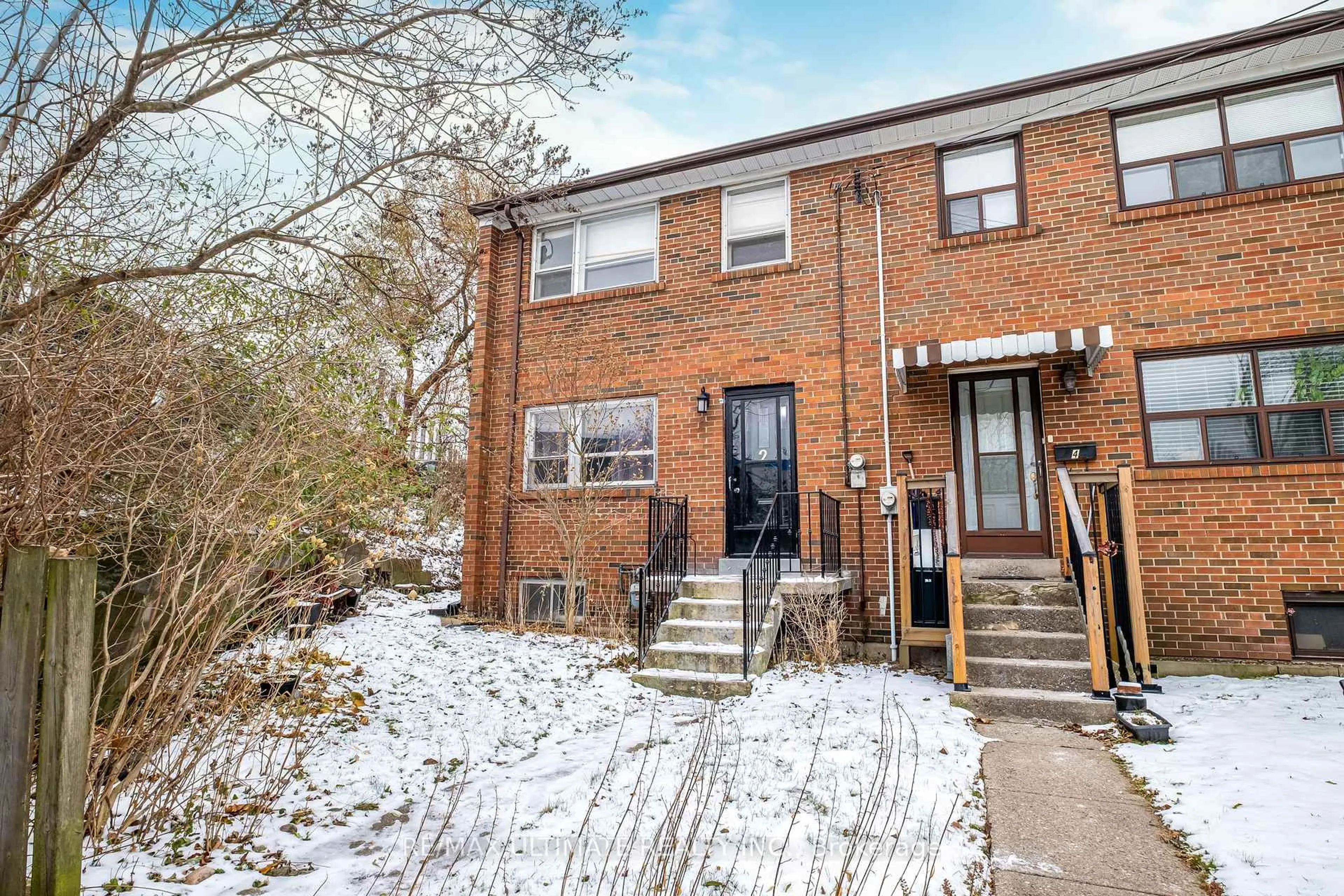 Home with brick exterior material, street for 2 Egan Ave, Toronto Ontario M4J 2Z3