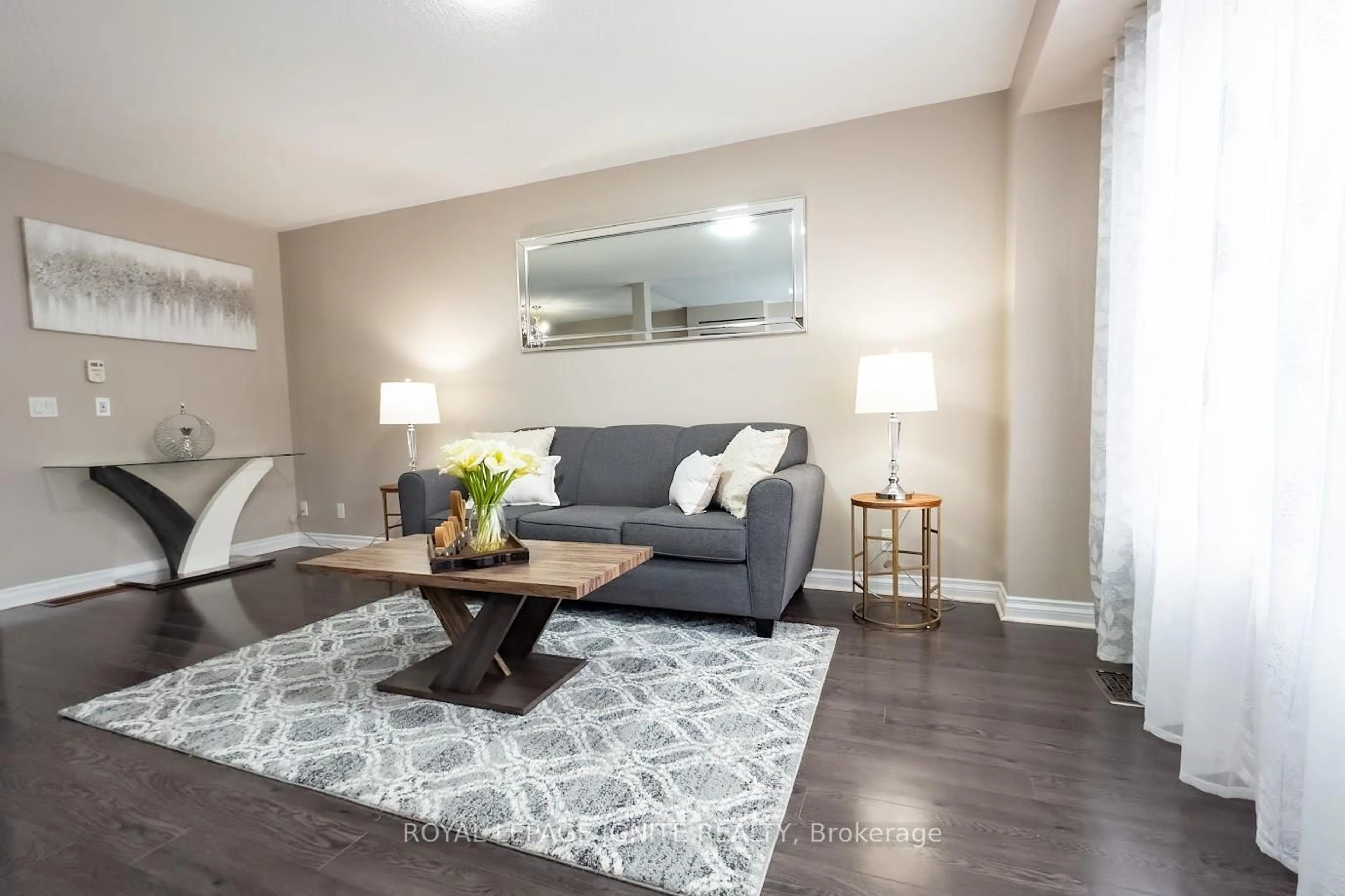 Living room with furniture, wood/laminate floor for 47 Tabaret Cres, Oshawa Ontario L1L 0G5