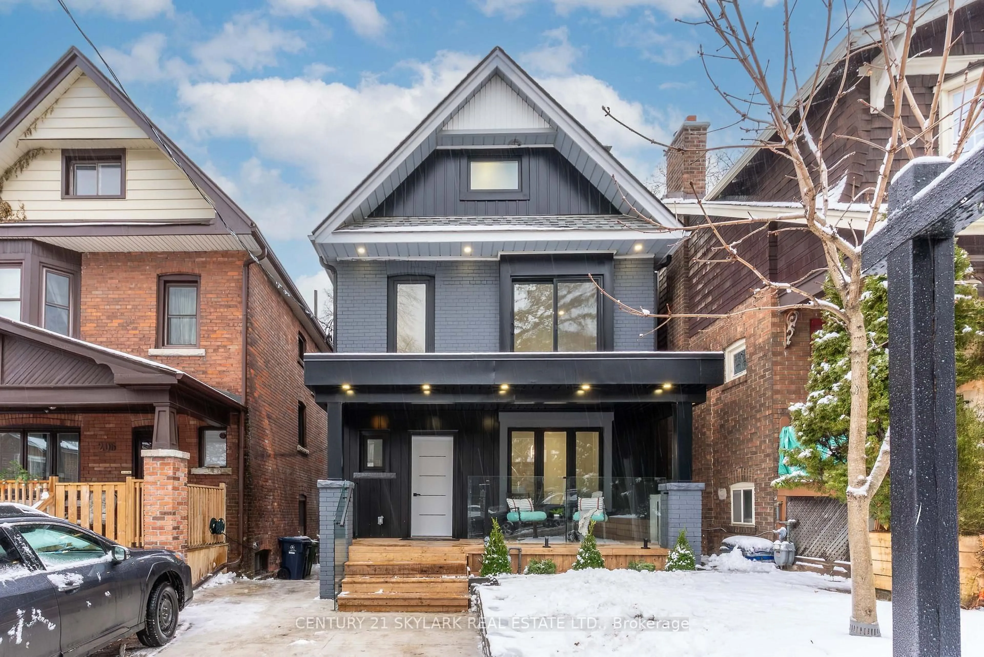 Home with brick exterior material, street for 208 Gainsborough Rd, Toronto Ontario M4L 3C6