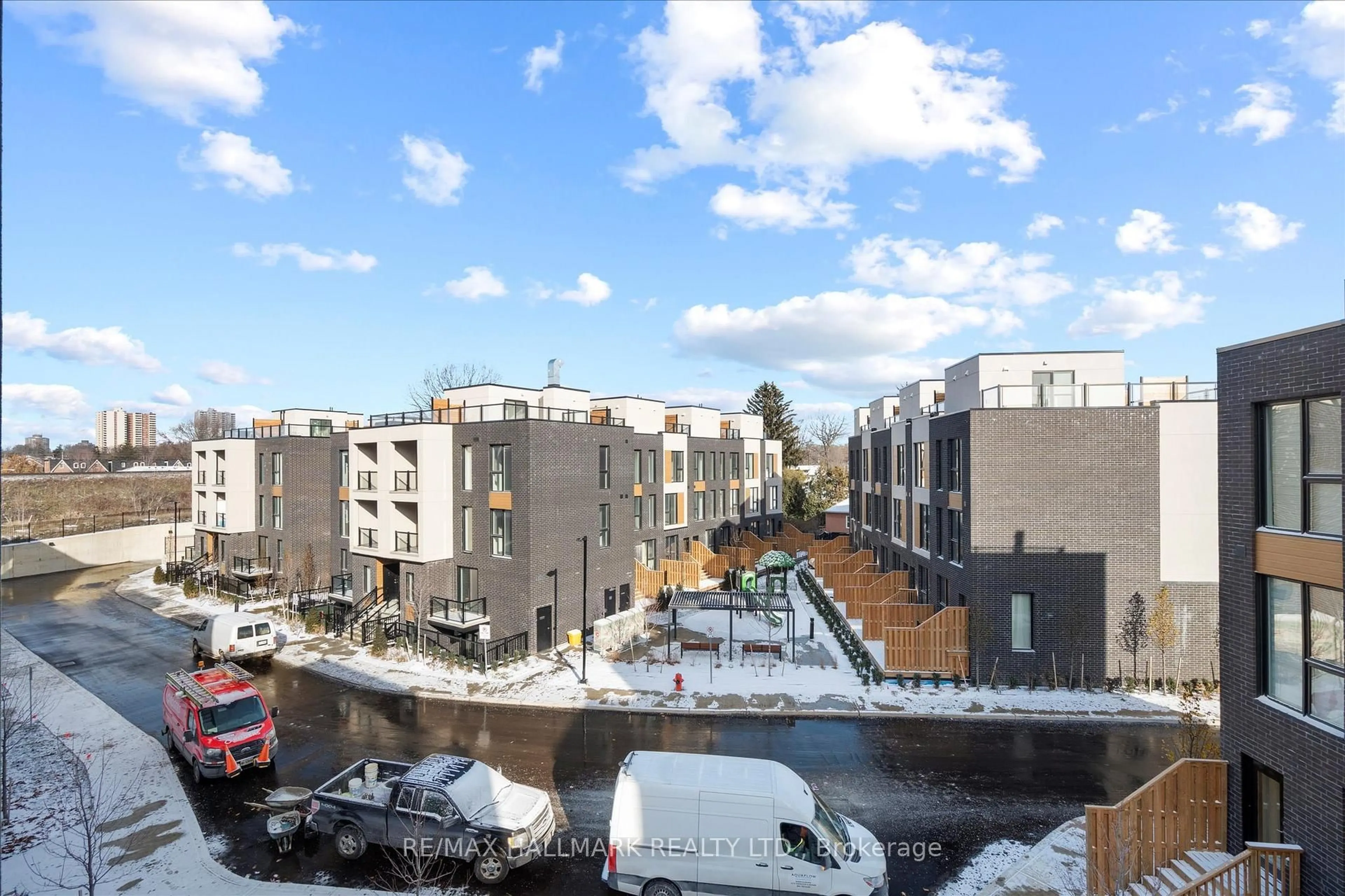 A pic from outside/outdoor area/front of a property/back of a property/a pic from drone, city buildings view from balcony for 170 Clonmore Dr #13, Toronto Ontario M1N 1Y1