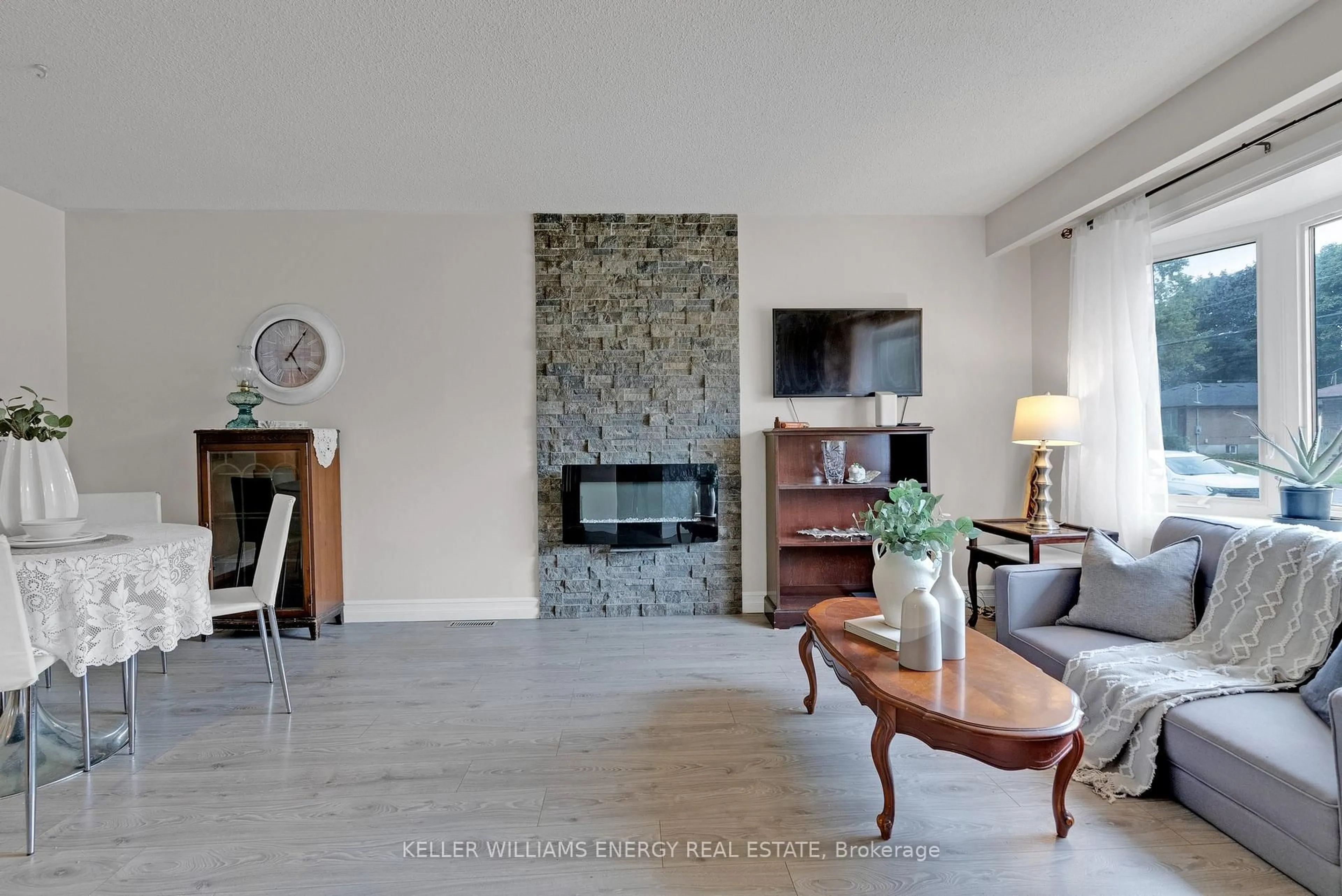 Living room with furniture, ceramic/tile floor for 242 Waverly St, Oshawa Ontario L1J 5V4