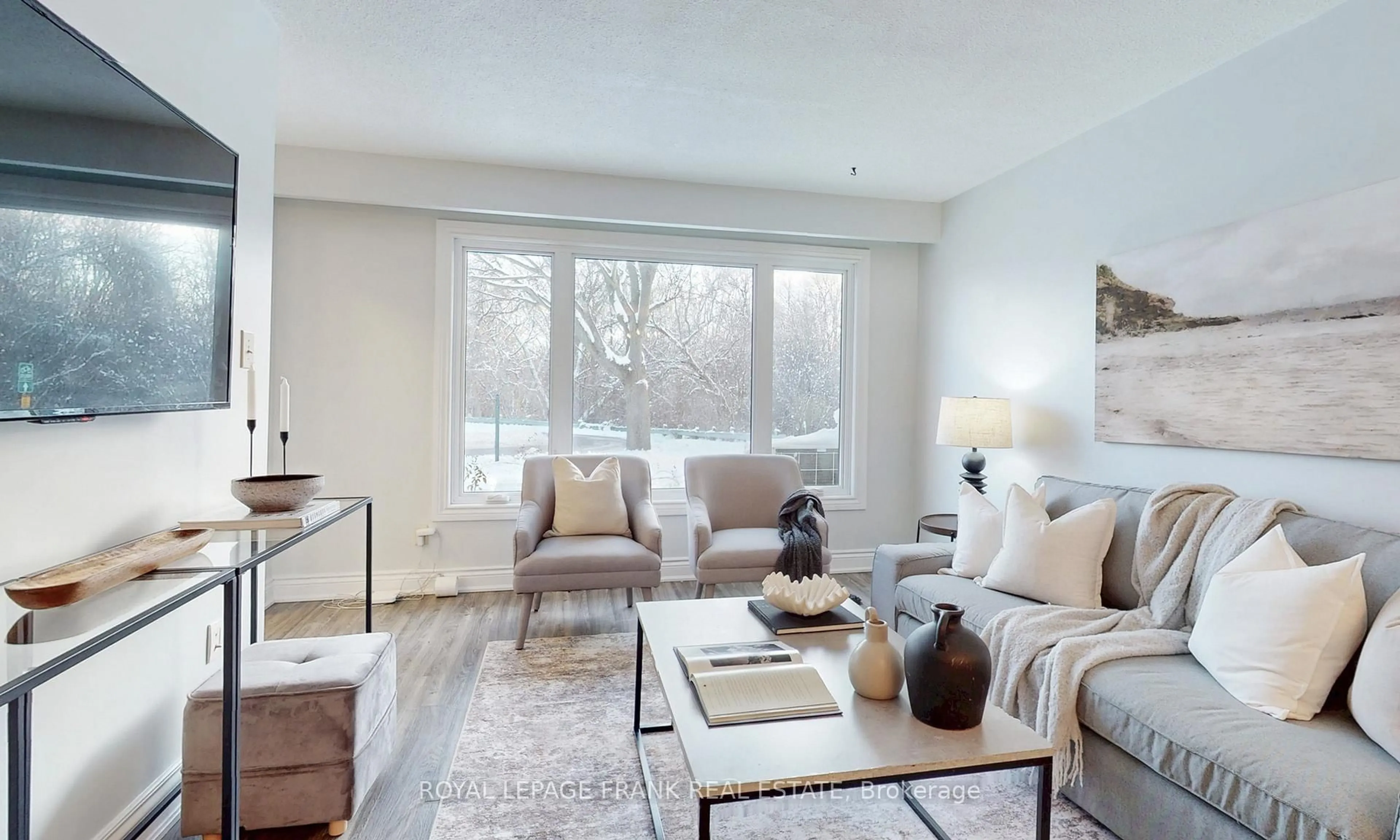 Living room with furniture, wood/laminate floor for 732 Annapolis Ave, Oshawa Ontario L1J 6H2