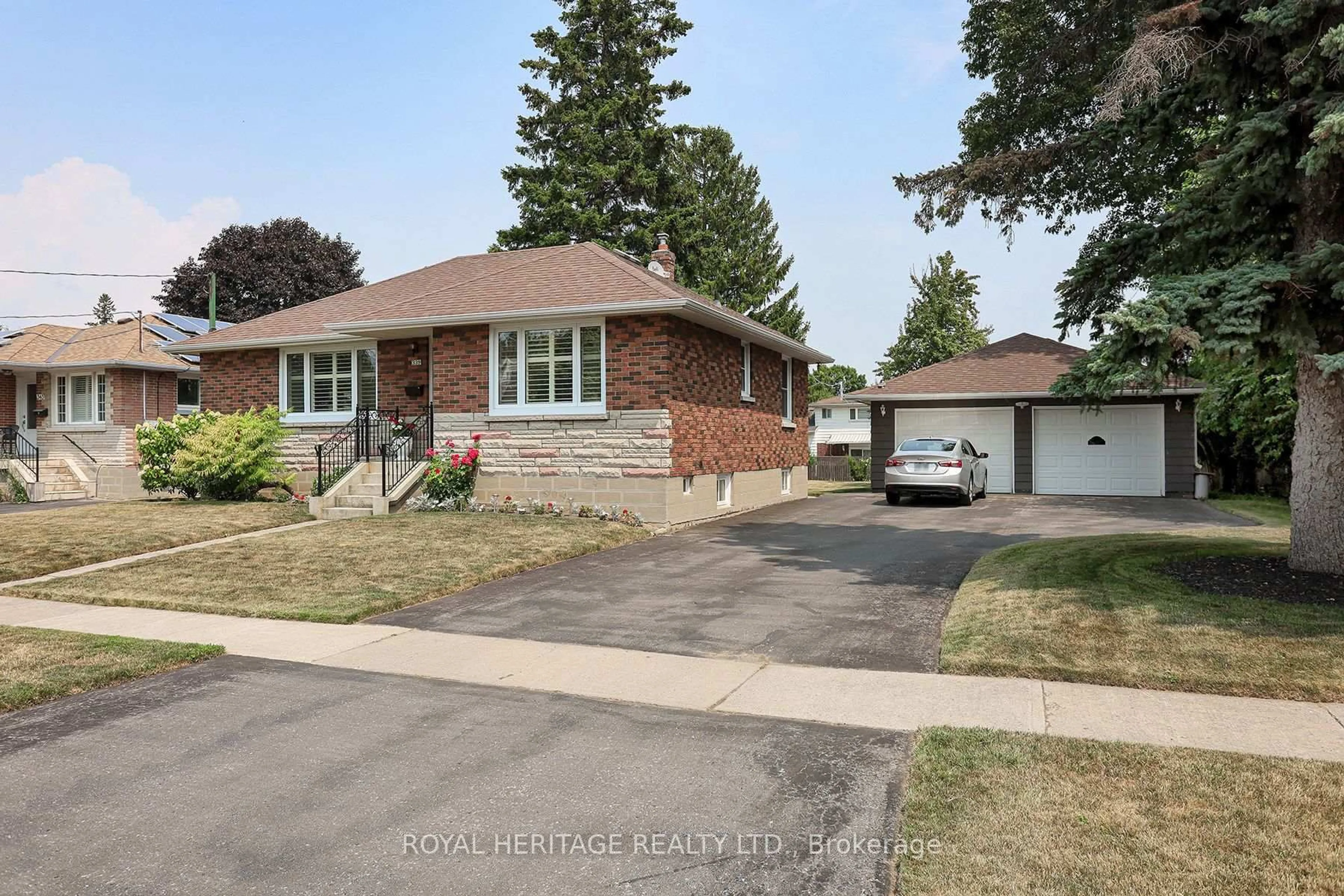 Home with brick exterior material, street for 339 Nipigon St, Oshawa Ontario L1J 4P1