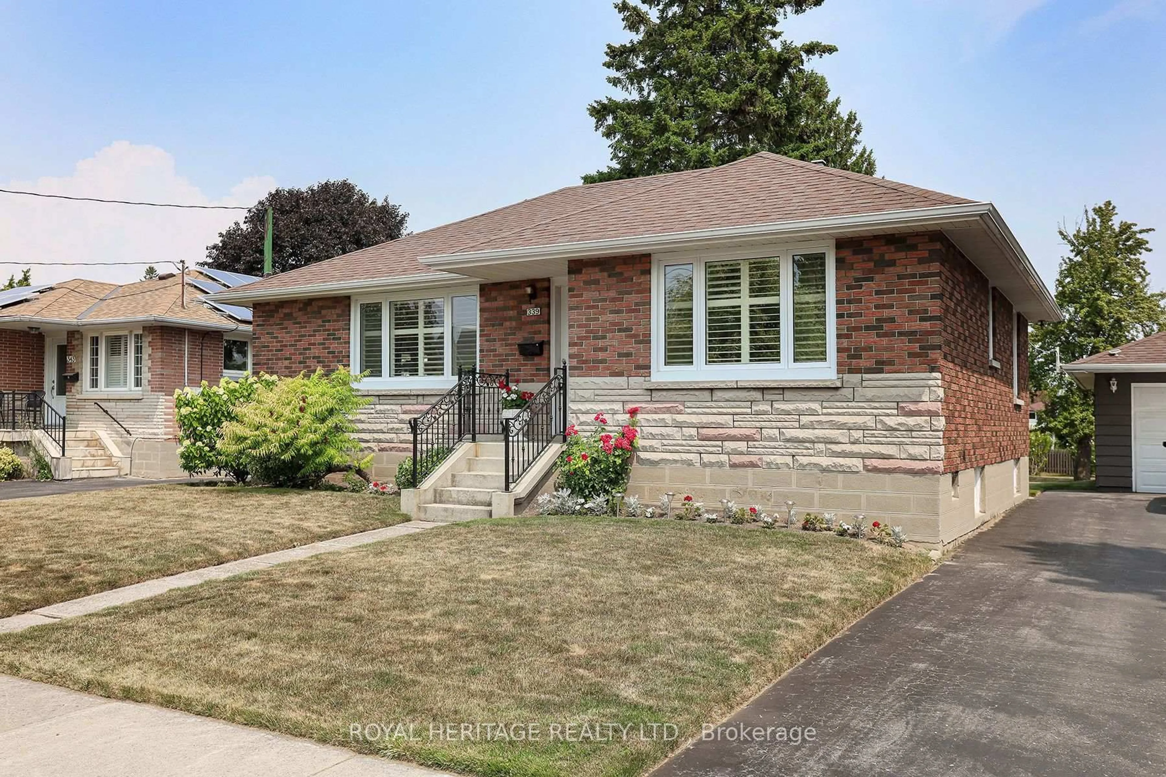 Home with brick exterior material, street for 339 Nipigon St, Oshawa Ontario L1J 4P1