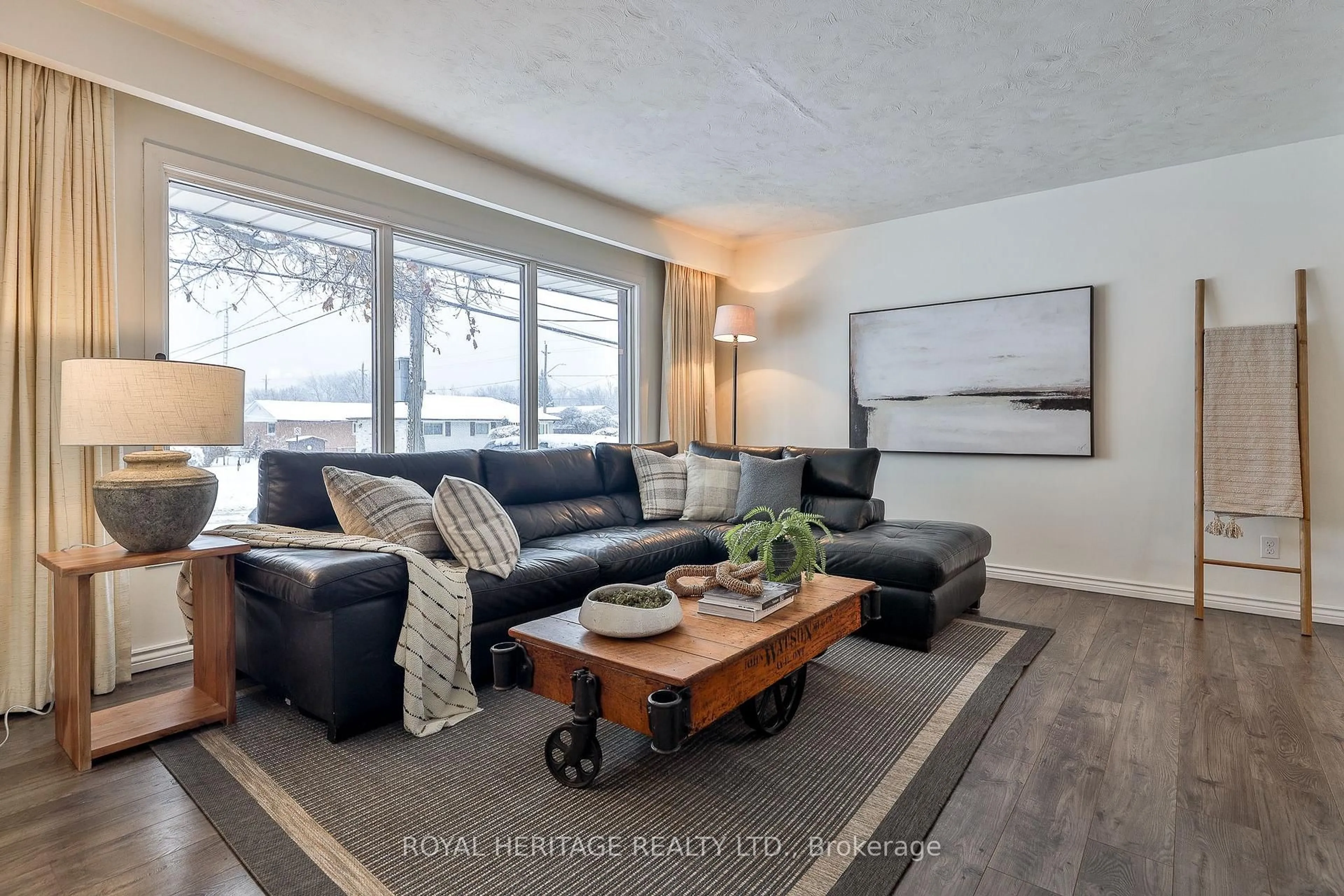 Living room with furniture, wood/laminate floor for 906 Dunlop St, Whitby Ontario L1N 1T2