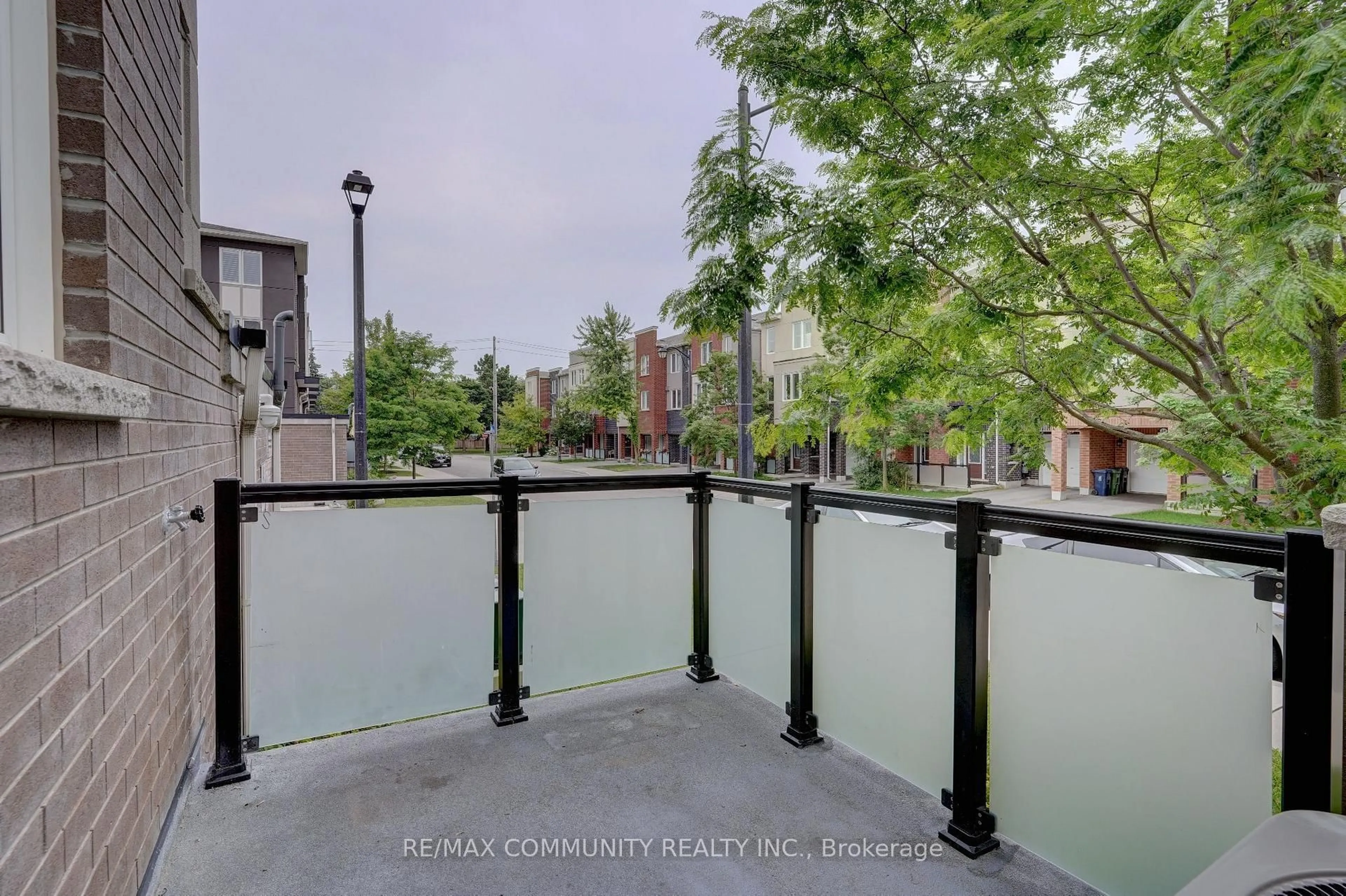 Patio, city buildings view from balcony for 45 Heron Park Pl #18, Toronto Ontario M1E 0B8