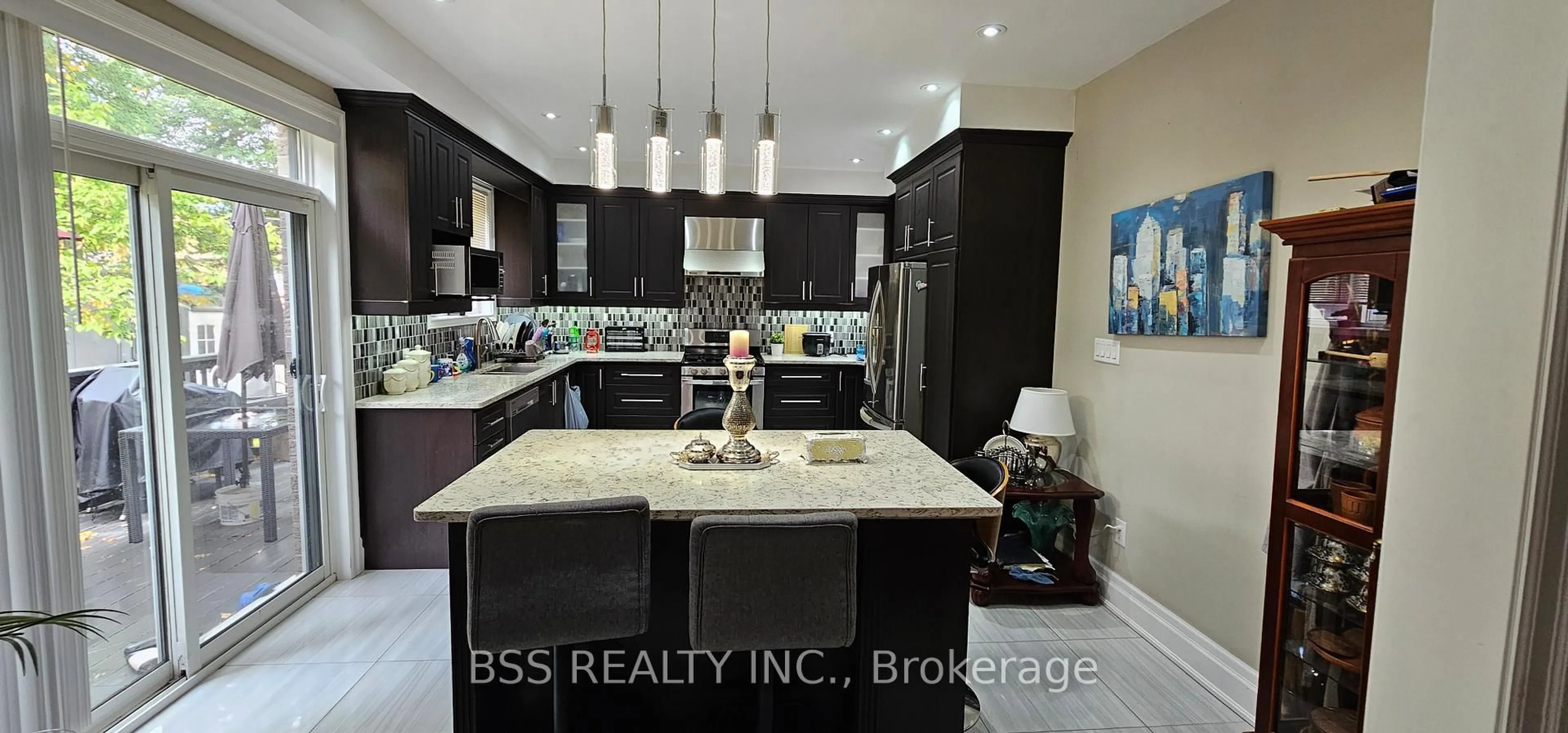 Open concept kitchen, ceramic/tile floor for 100 Meighen Ave, Toronto Ontario M4B 2H7