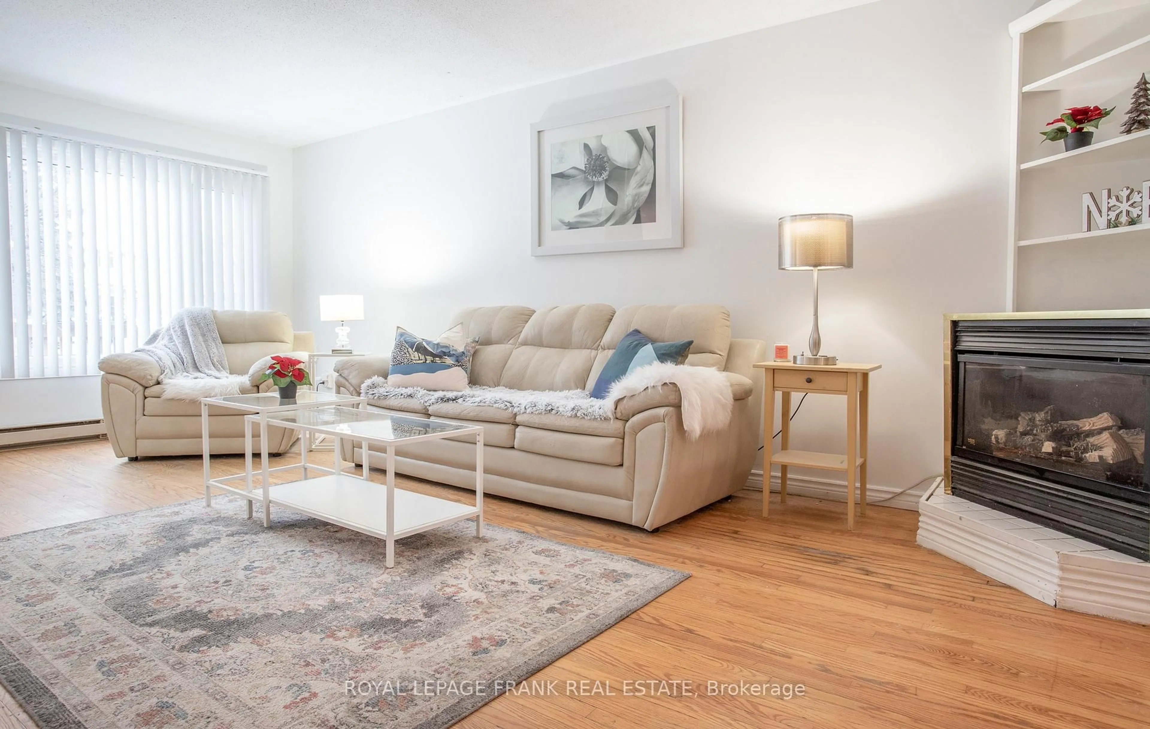 Living room with furniture, wood/laminate floor for 118 Capreol Crt, Oshawa Ontario L1J 6E6