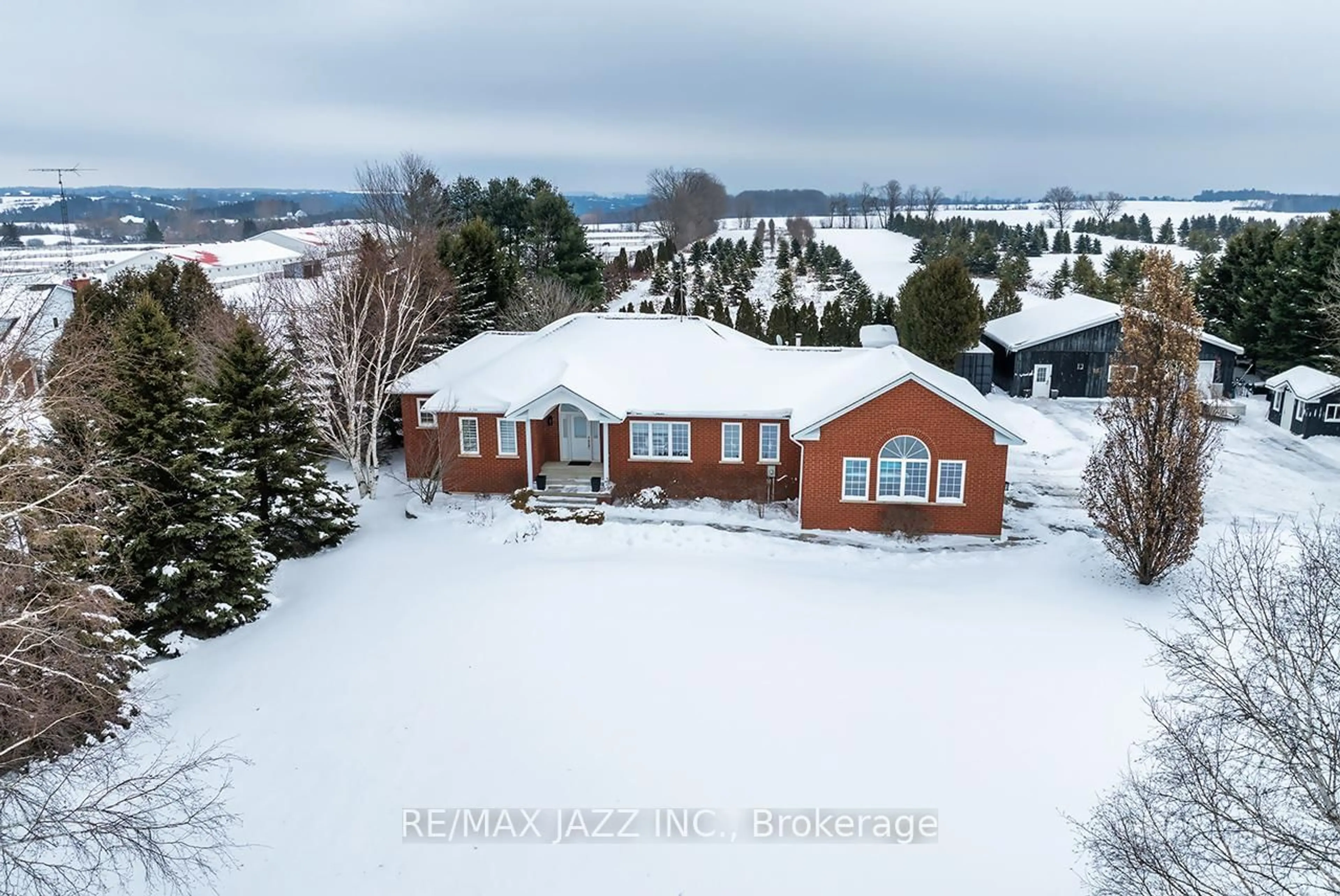 A pic from outside/outdoor area/front of a property/back of a property/a pic from drone, mountain view for 8495 Enfield Rd, Clarington Ontario L0B 1J0