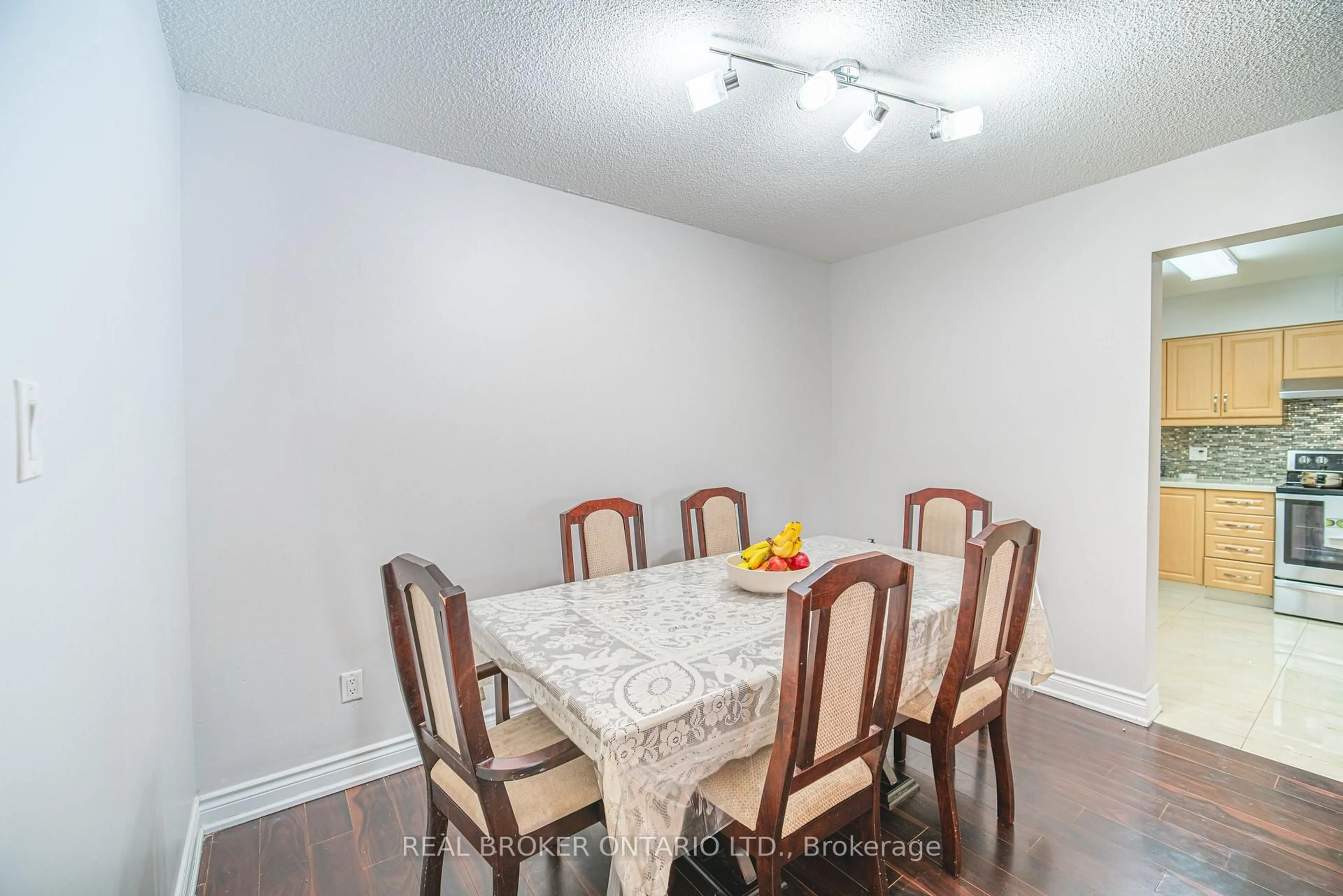 Dining room, wood/laminate floor for 39 Kimbercroft Crt #414, Toronto Ontario M1S 5B5