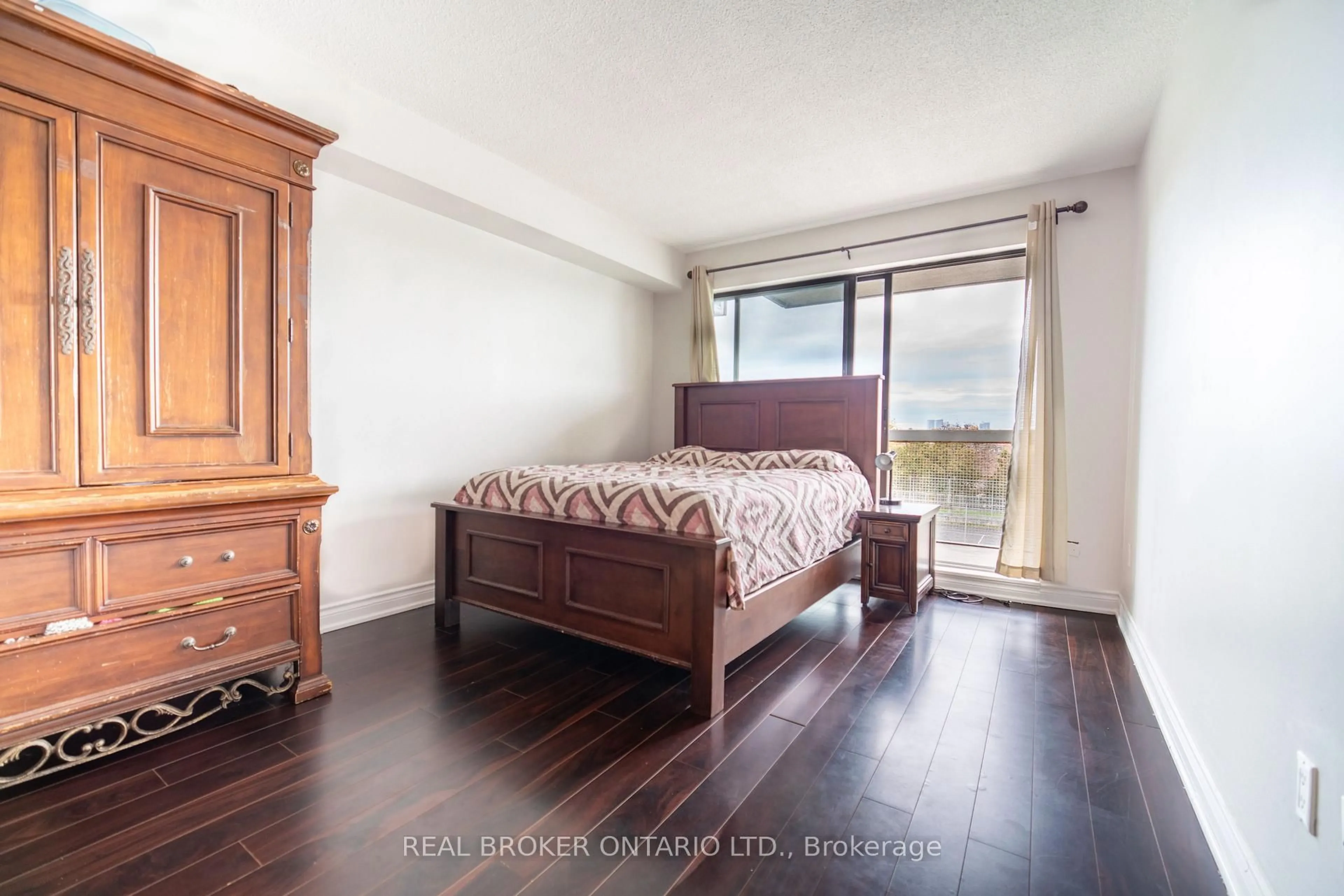 Bedroom with bed, wood/laminate floor for 39 Kimbercroft Crt #414, Toronto Ontario M1S 5B5