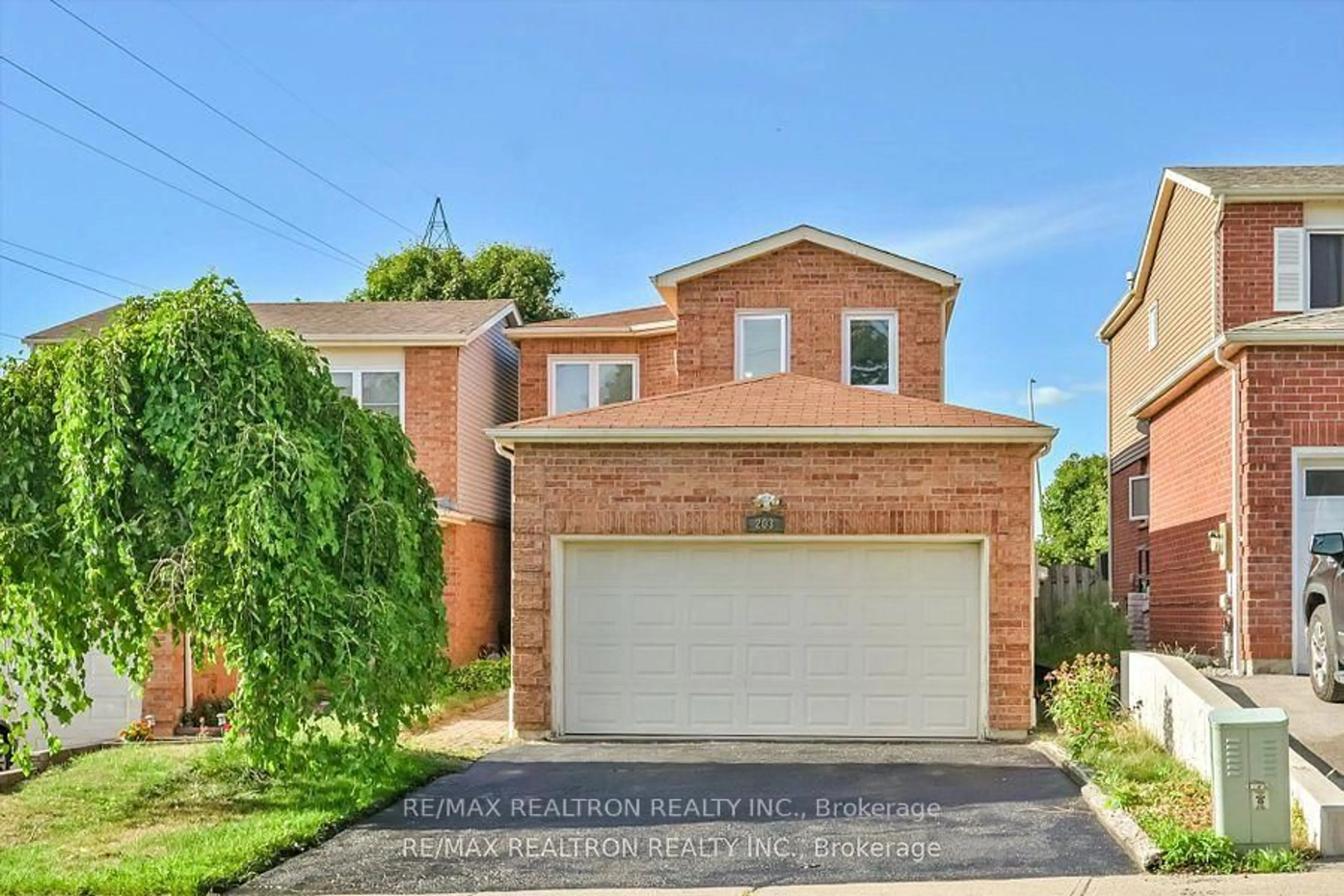 Home with brick exterior material, street for 203 Glen Hill Dr, Whitby Ontario L1N 7J5