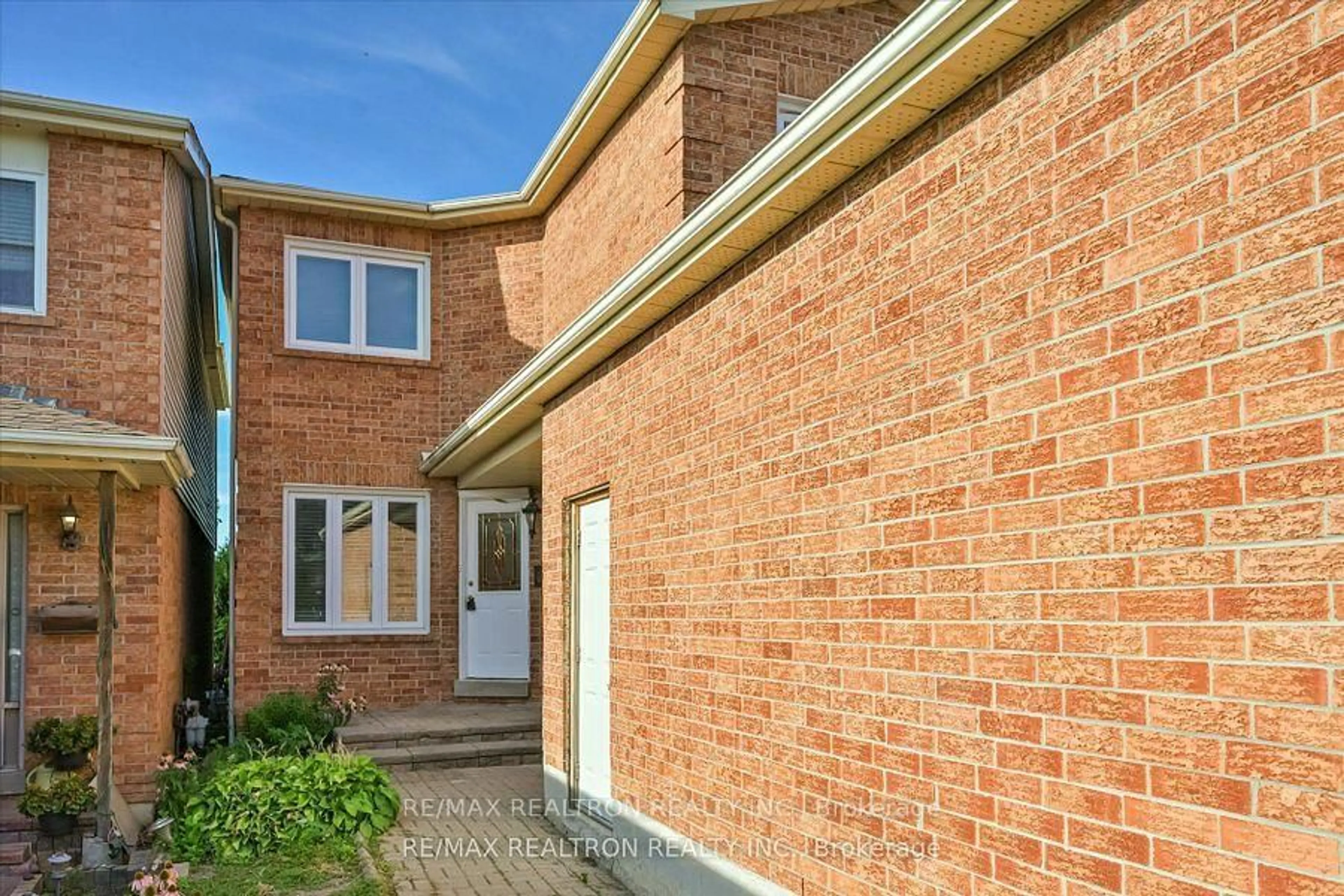 Home with brick exterior material, street for 203 Glen Hill Dr, Whitby Ontario L1N 7J5