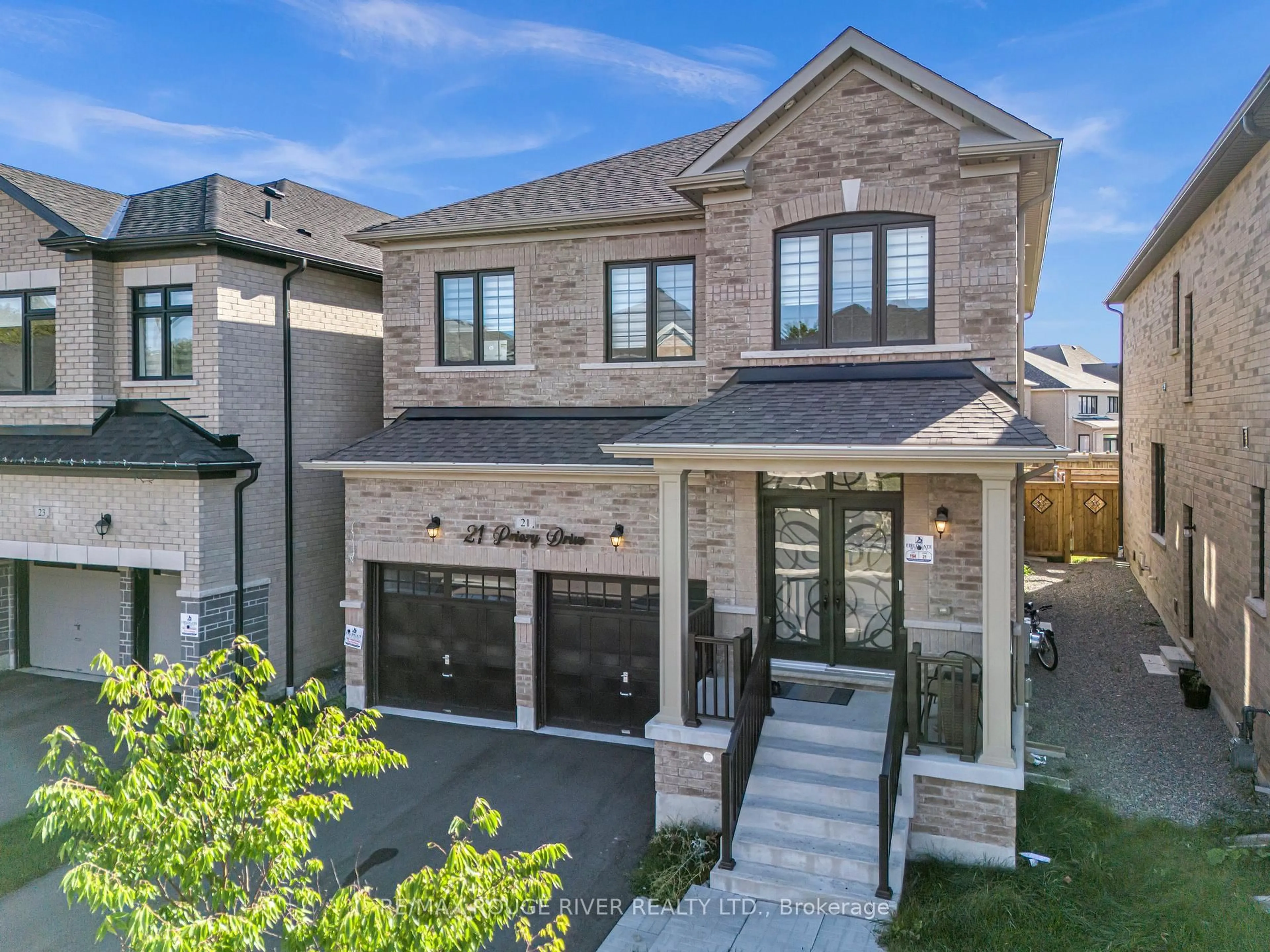 Home with brick exterior material, street for 21 Priory Dr, Whitby Ontario L1P 0K9