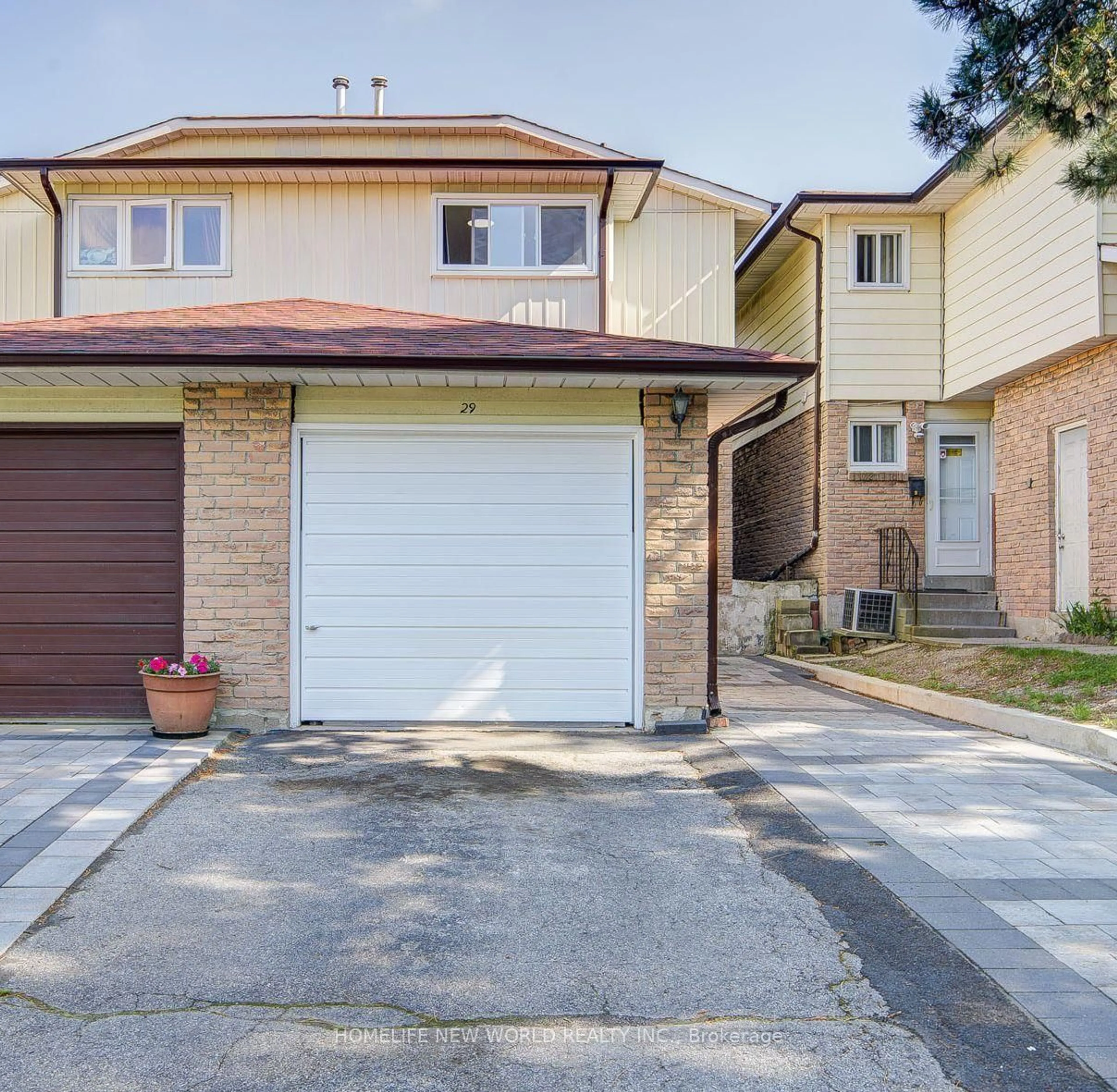 Home with brick exterior material, street for 29 Puma Dr, Toronto Ontario M1V 1J7