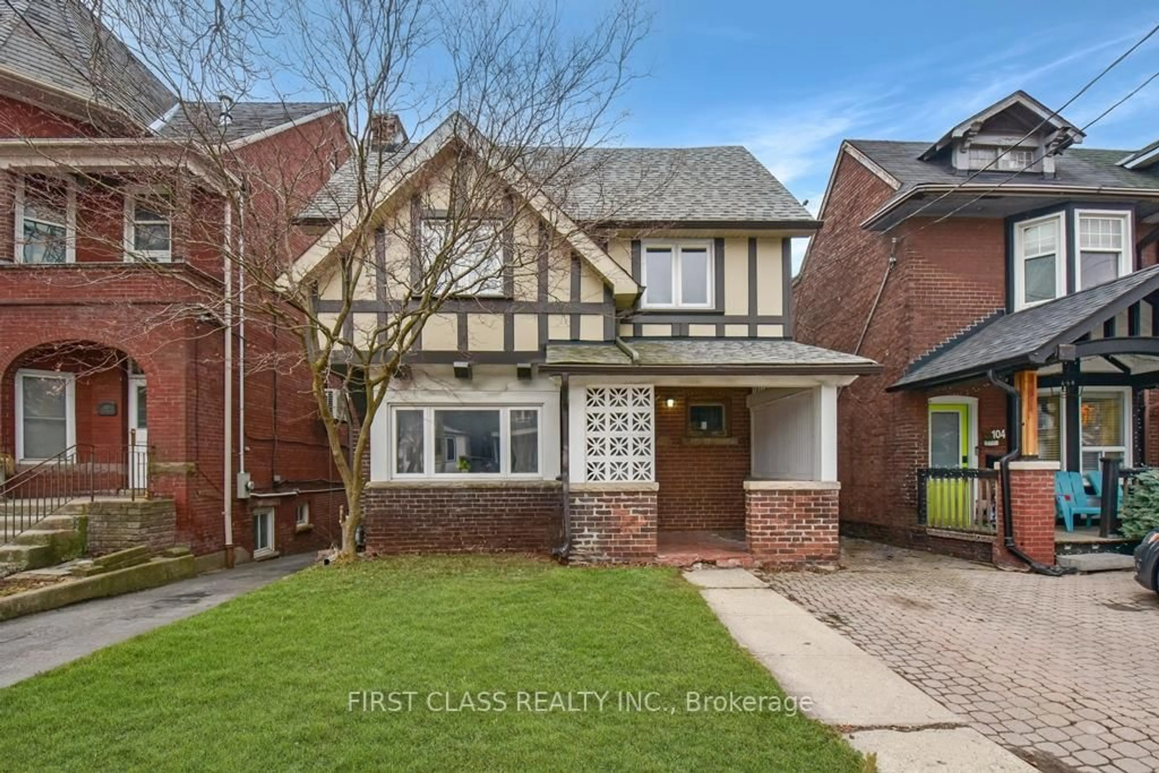 Home with brick exterior material, street for 102 Greenwood Ave, Toronto Ontario M4L 2P6