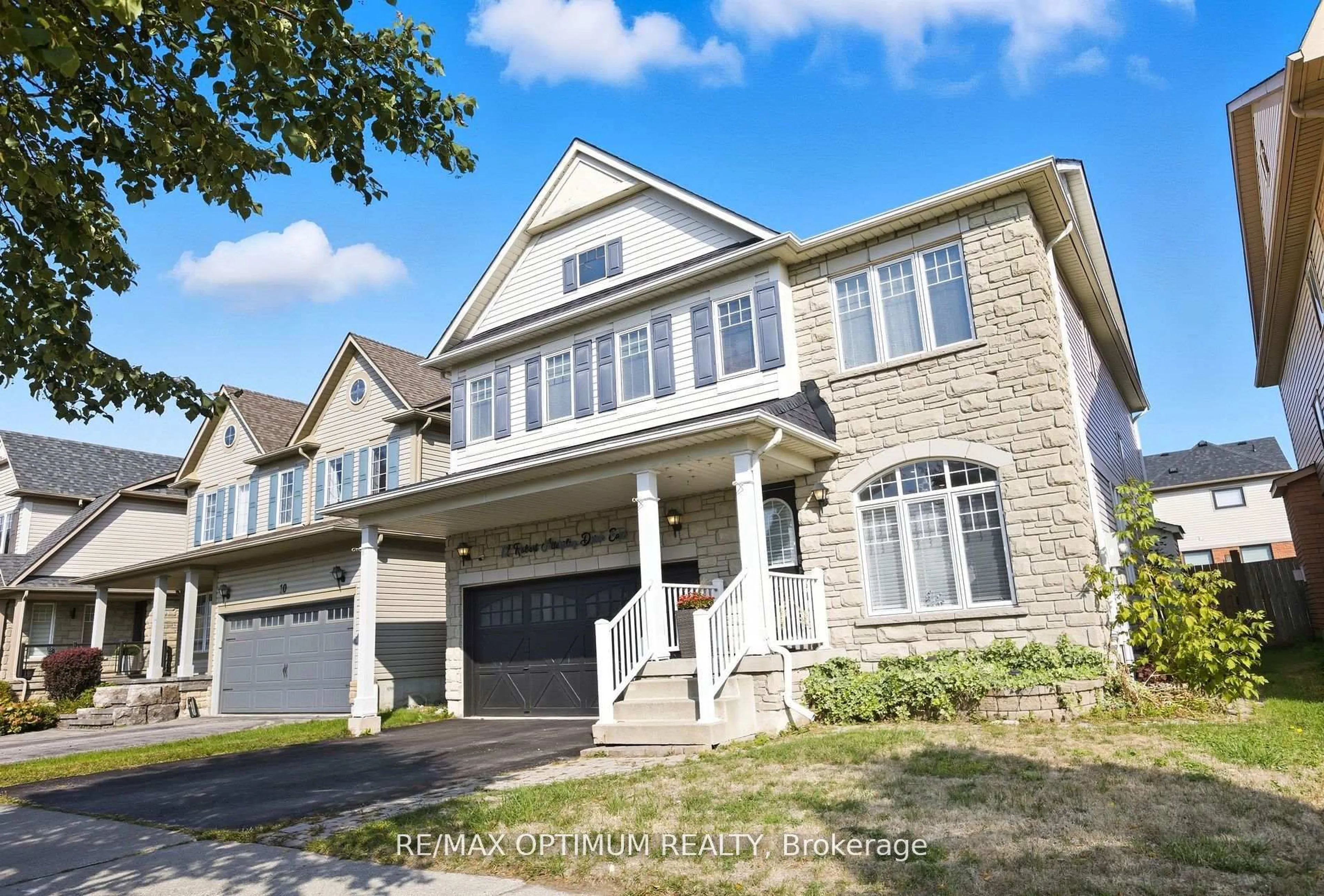 Home with brick exterior material, street for 12 Robert Attersley Dr, Whitby Ontario L1R 3E3