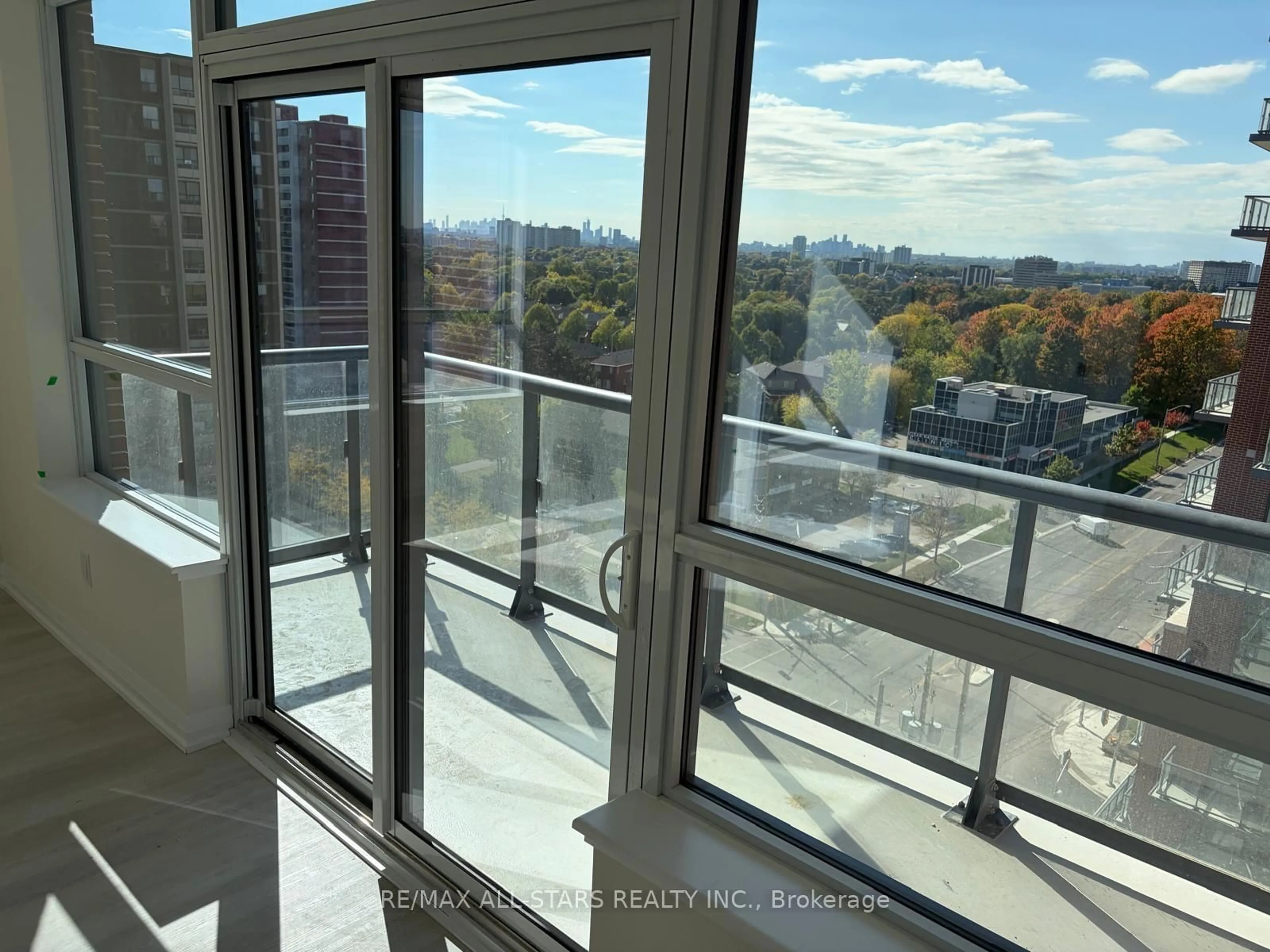 Balcony in the apartment, city buildings view from balcony for 3270 Sheppard Ave #1124, Toronto Ontario M1T 3K3