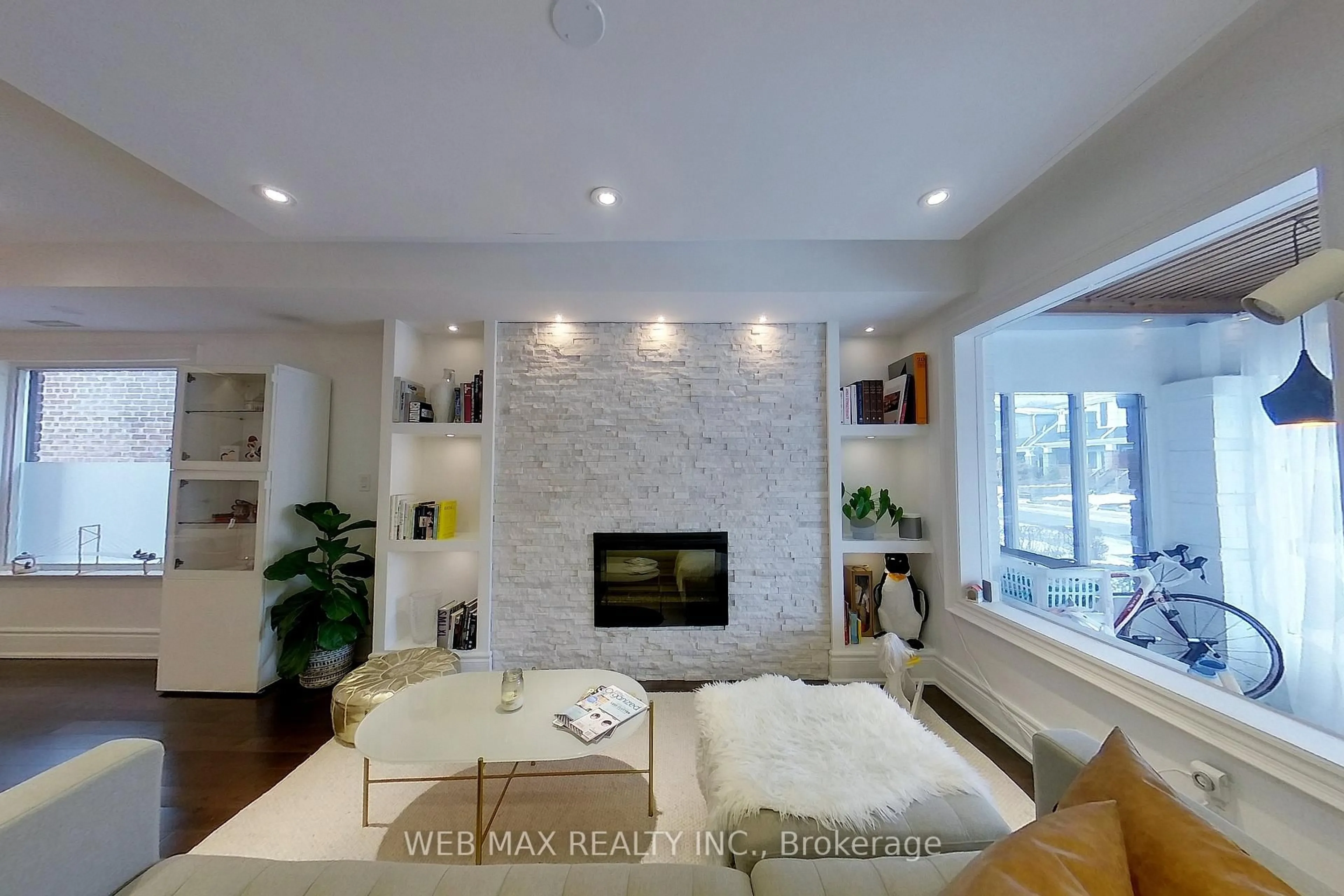 Living room with furniture, ceramic/tile floor for 173 Milverton Blvd, Toronto Ontario M4J 1V2