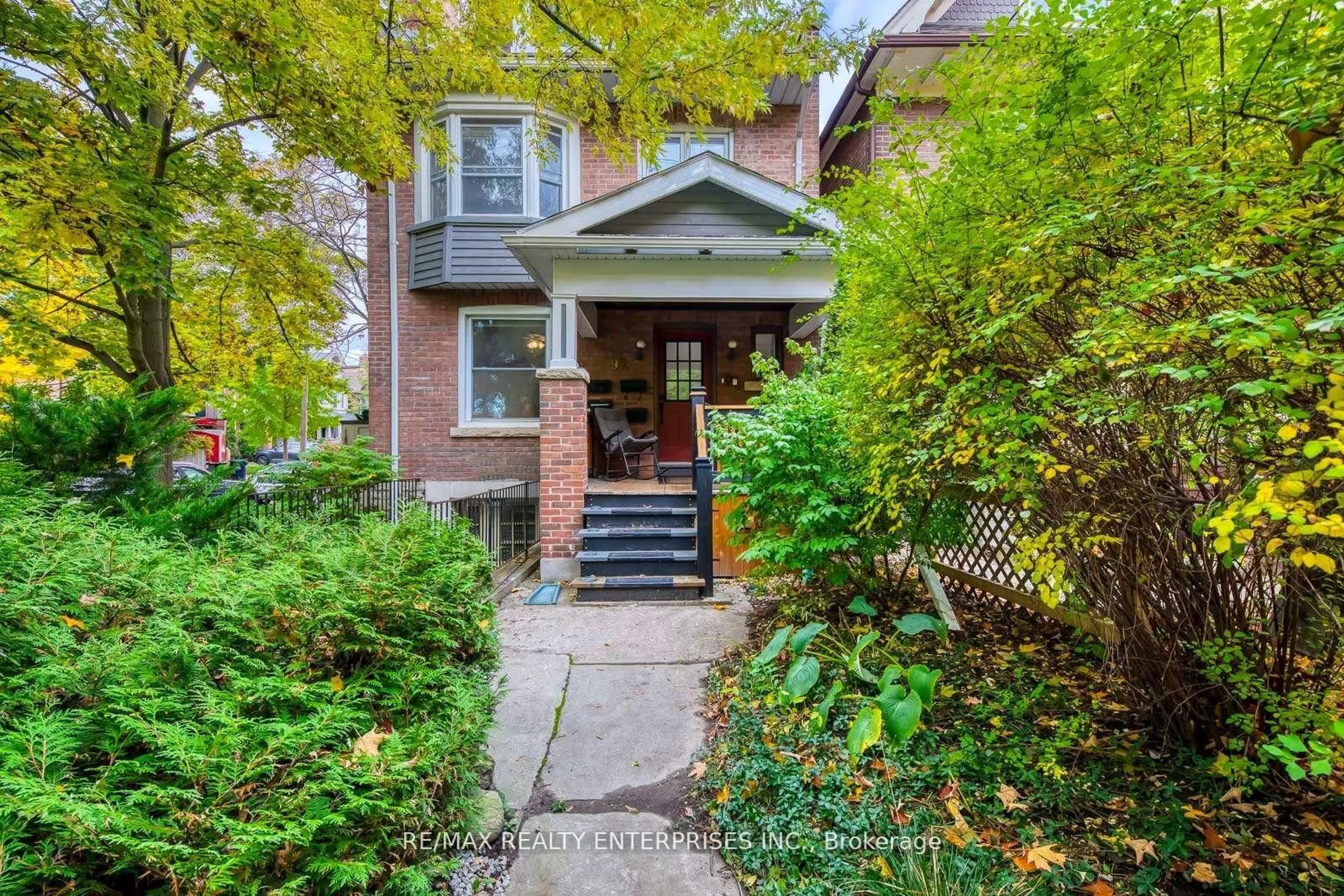 Home with brick exterior material, street for 92 Dixon Ave, Toronto Ontario M4L 1N7