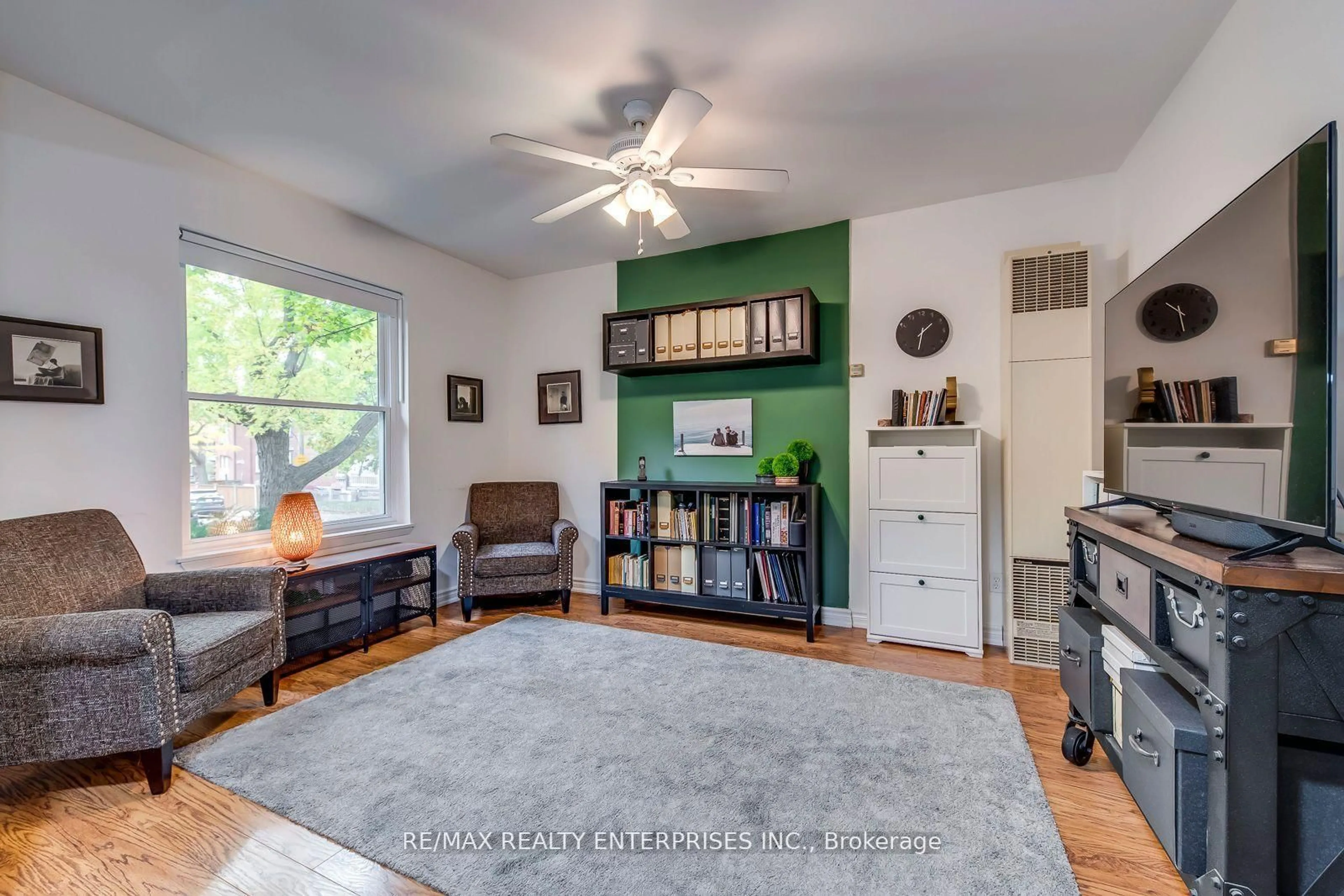 Living room with furniture, unknown for 92 Dixon Ave, Toronto Ontario M4L 1N7