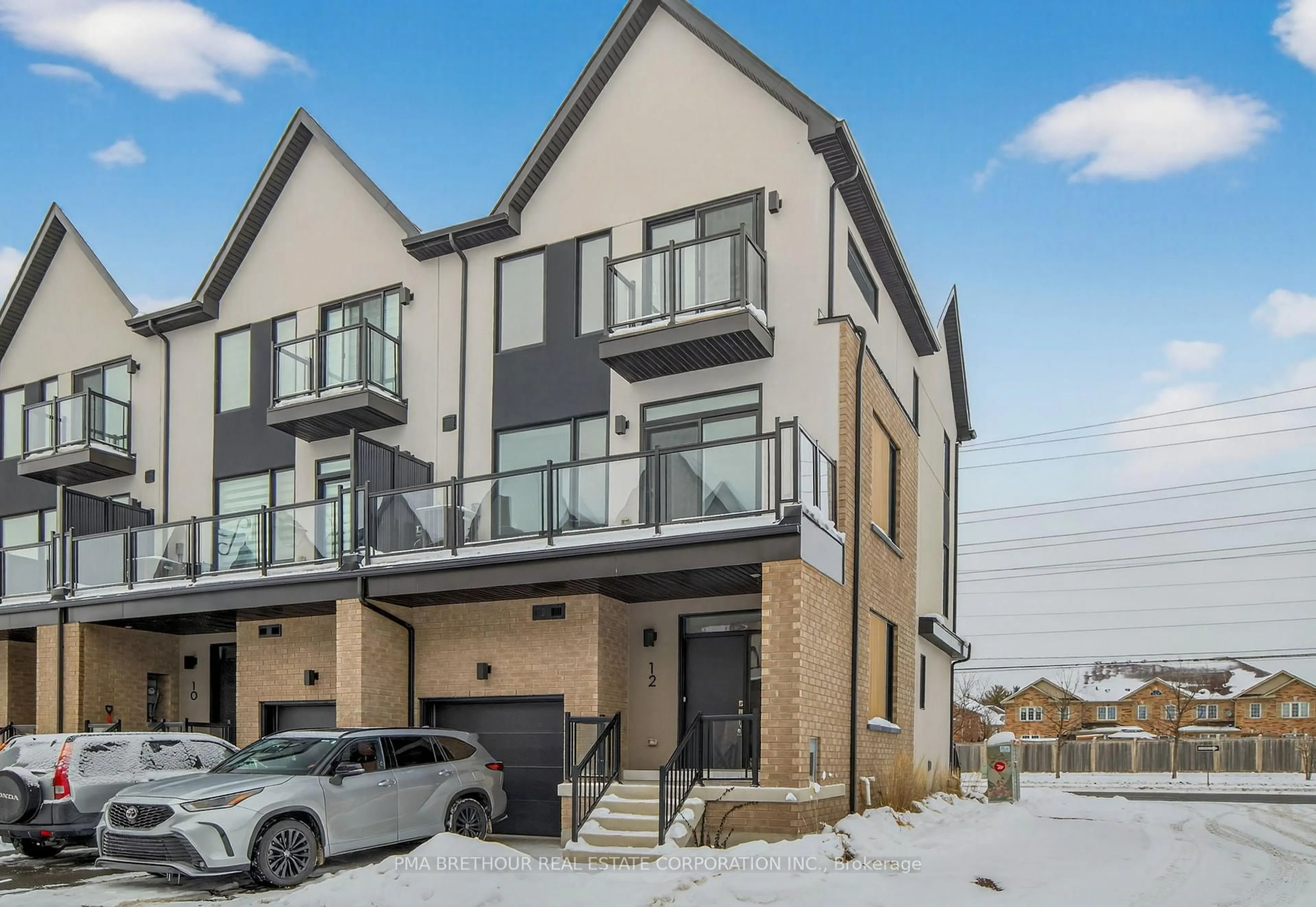 Home with brick exterior material, street for 12 Lively Way, Whitby Ontario L1R 0S3