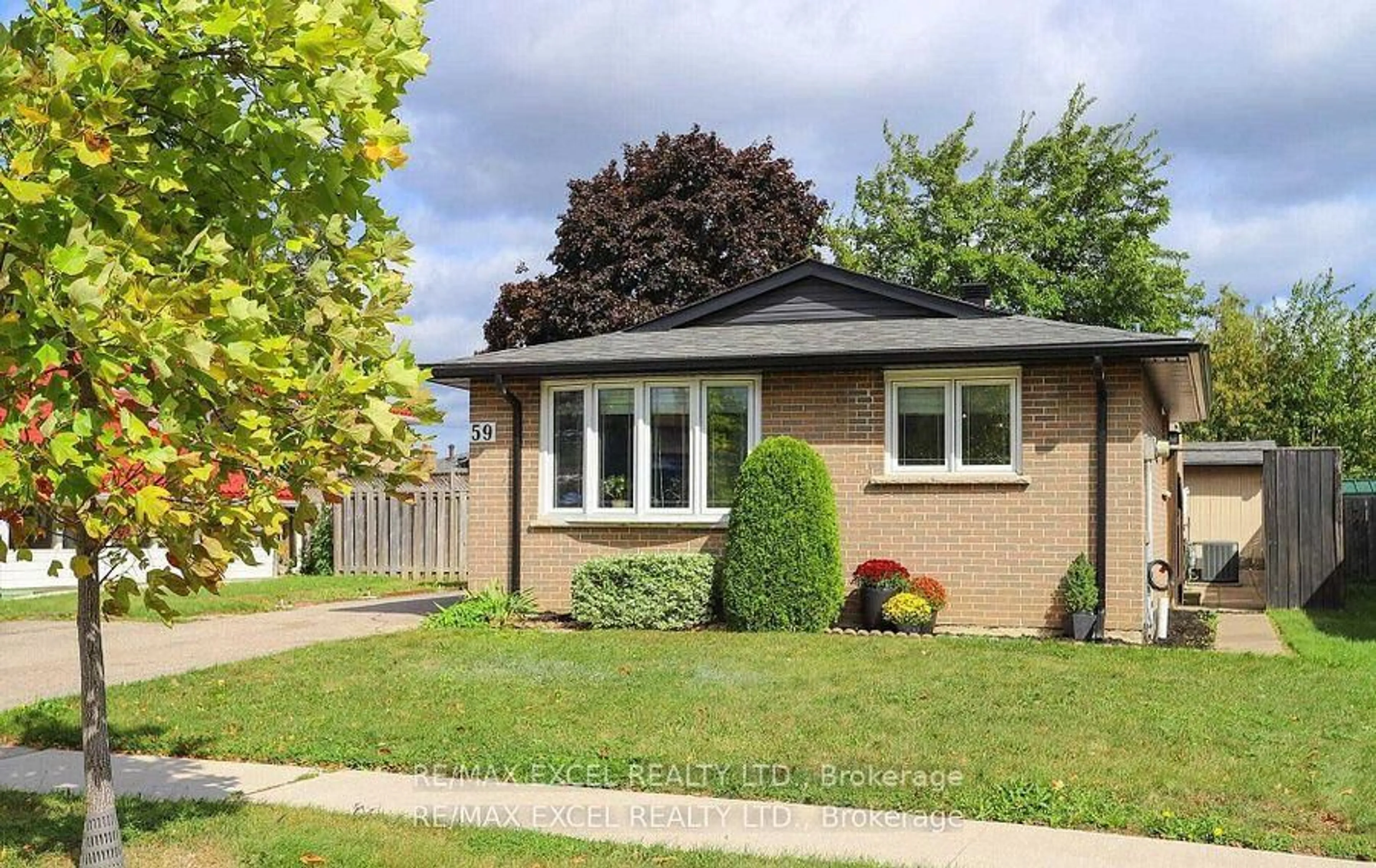 Home with brick exterior material, street for 59 Parkington Cres, Toronto Ontario M1H 2T9