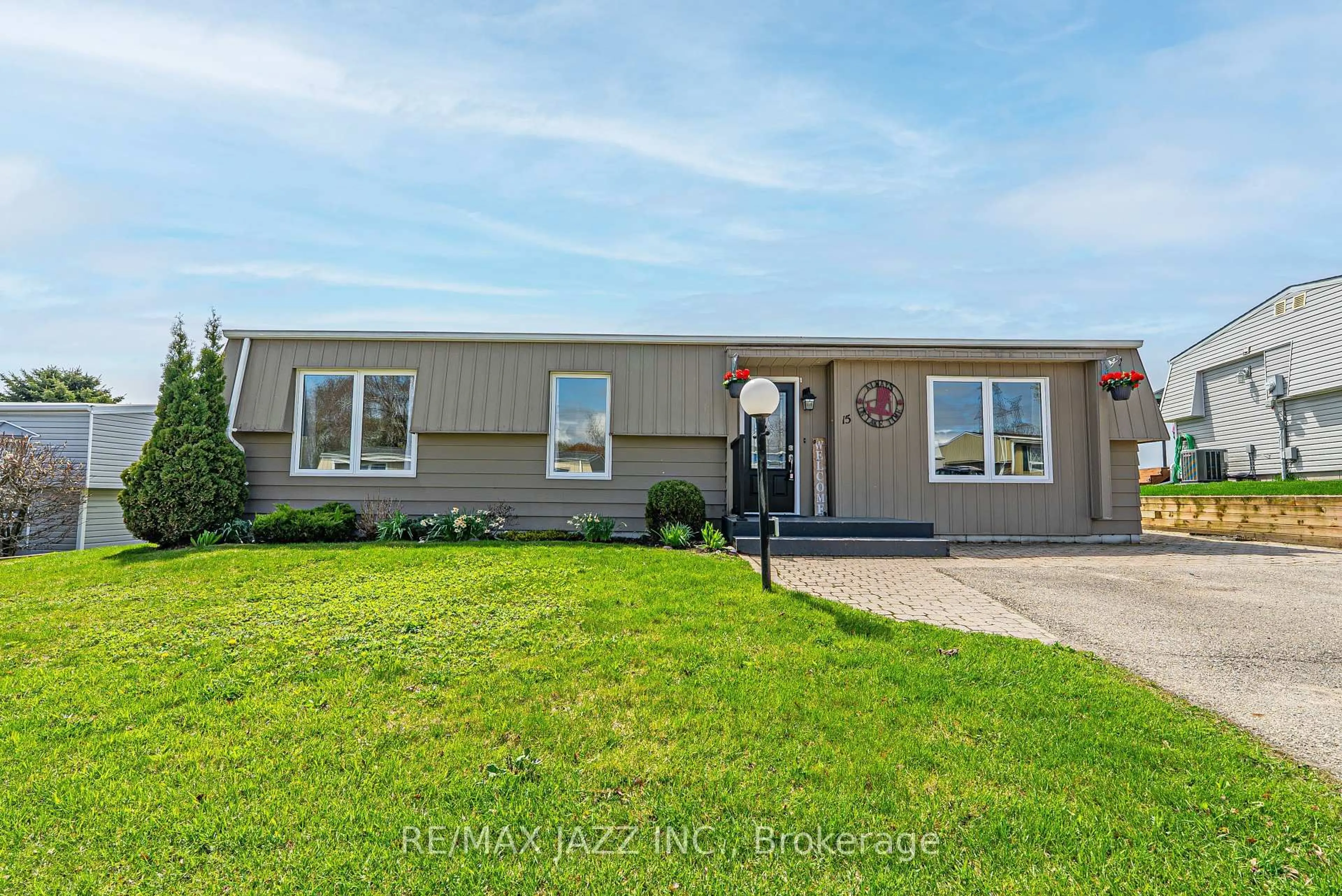 Home with vinyl exterior material, street for 15 Bluffs Rd, Clarington Ontario L1B 1A3