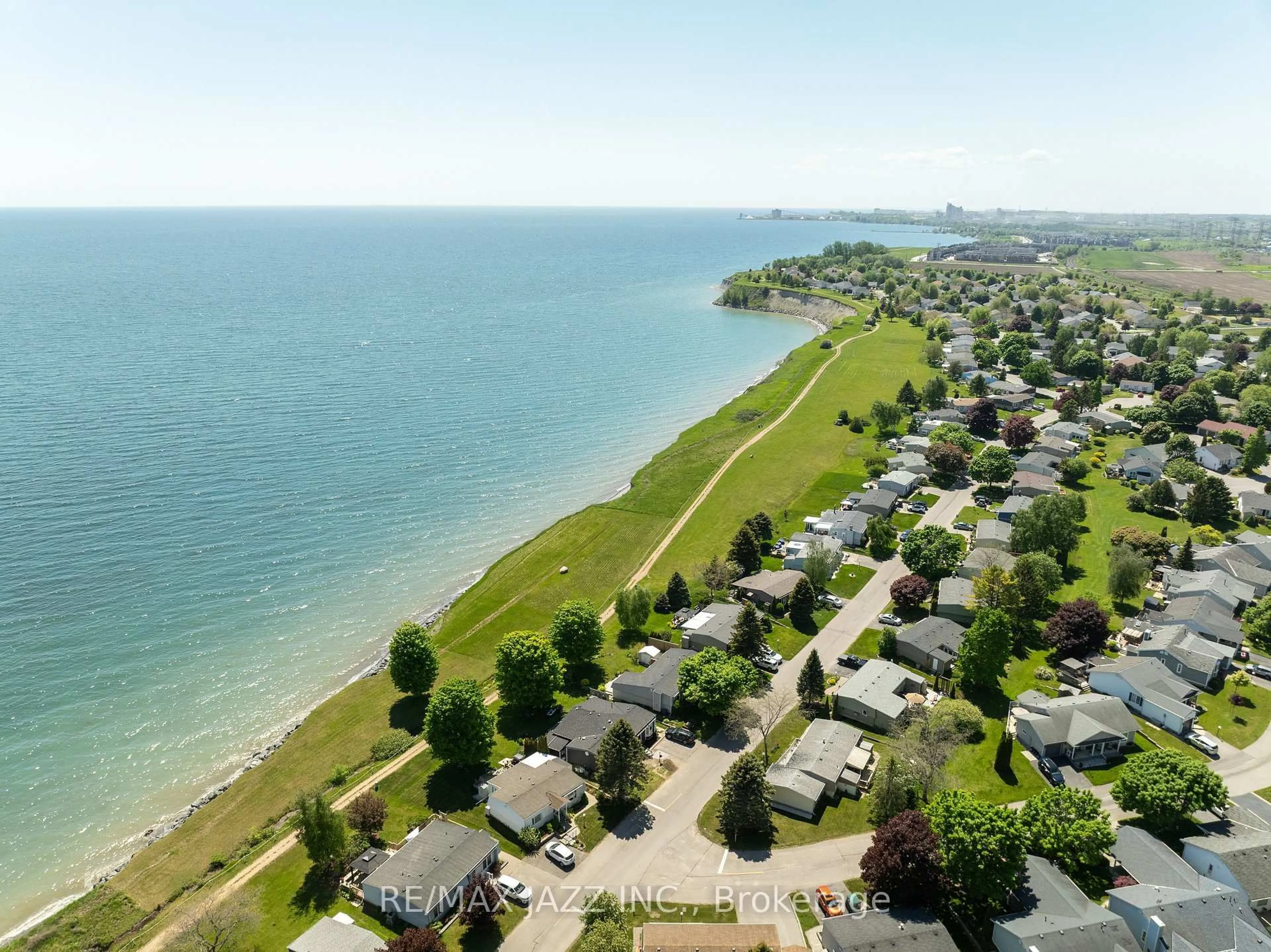 A pic from outside/outdoor area/front of a property/back of a property/a pic from drone, water/lake/river/ocean view for 15 Bluffs Rd, Clarington Ontario L1B 1A3