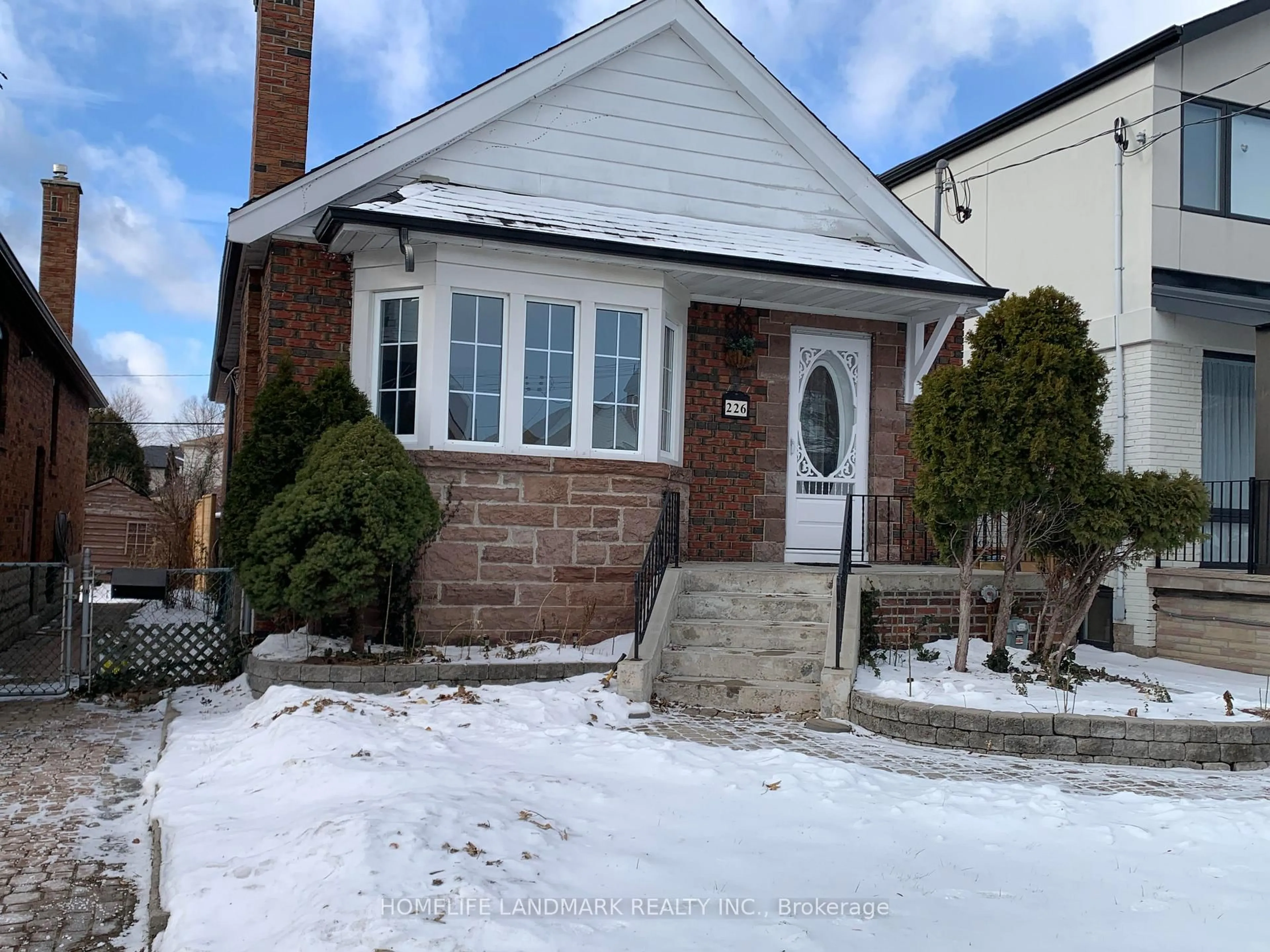 Home with brick exterior material, street for 226 Donlands Ave, Toronto Ontario M4J 3R2