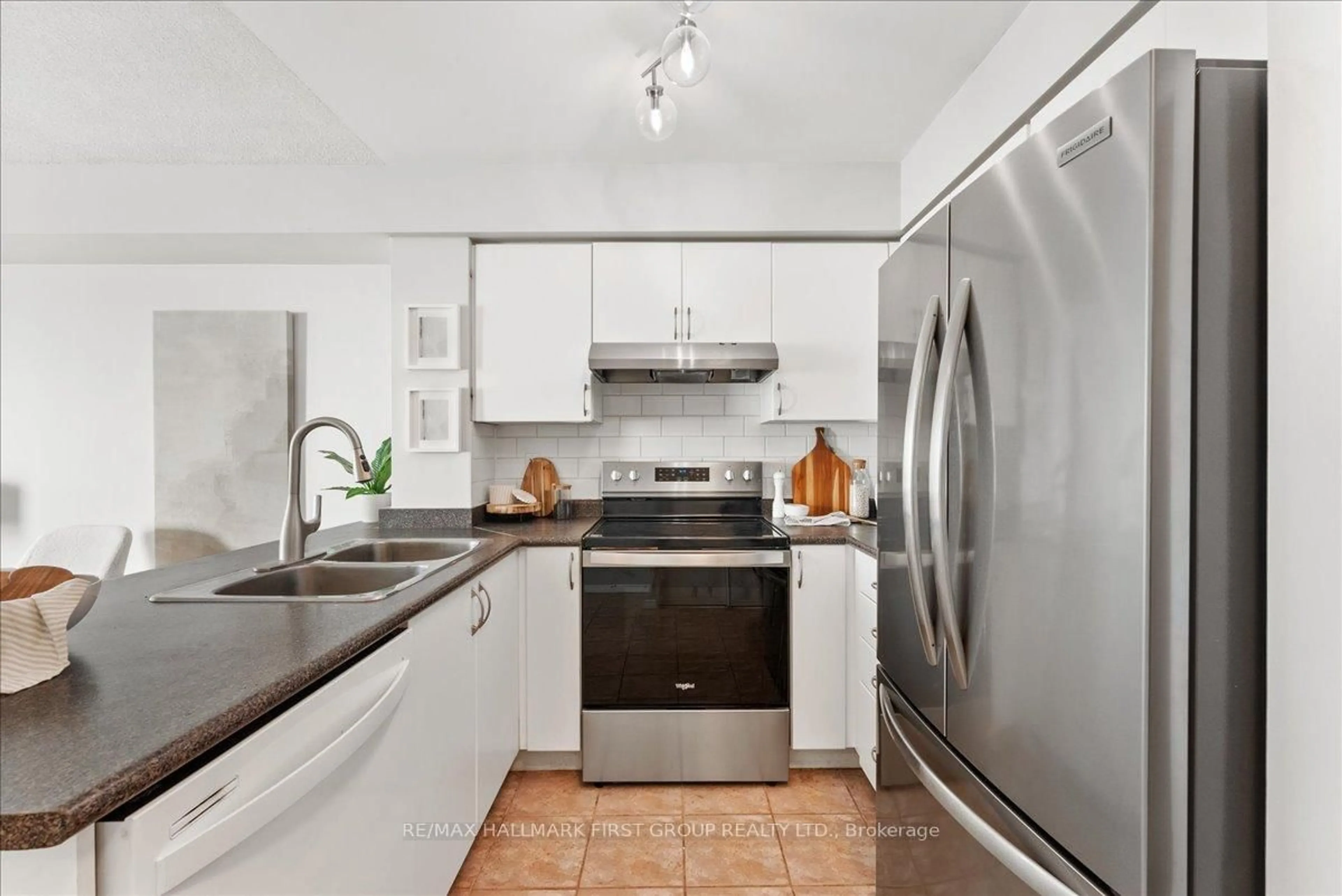 Standard kitchen, ceramic/tile floor for 340 Watson St #218, Whitby Ontario L1N 9G1