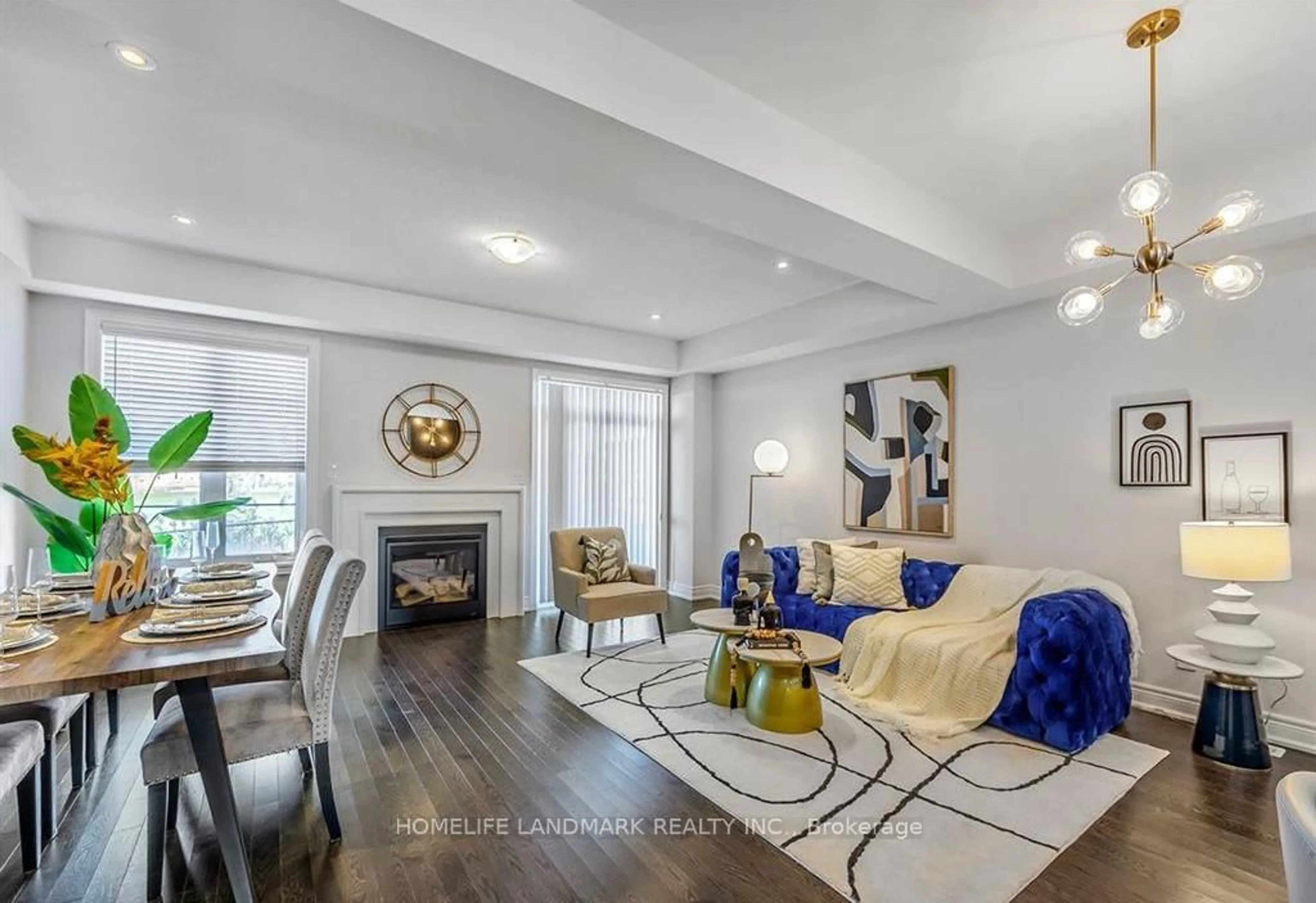 Living room with furniture, wood/laminate floor for 100 Christine Elliot Ave, Whitby Ontario L1P 0B5