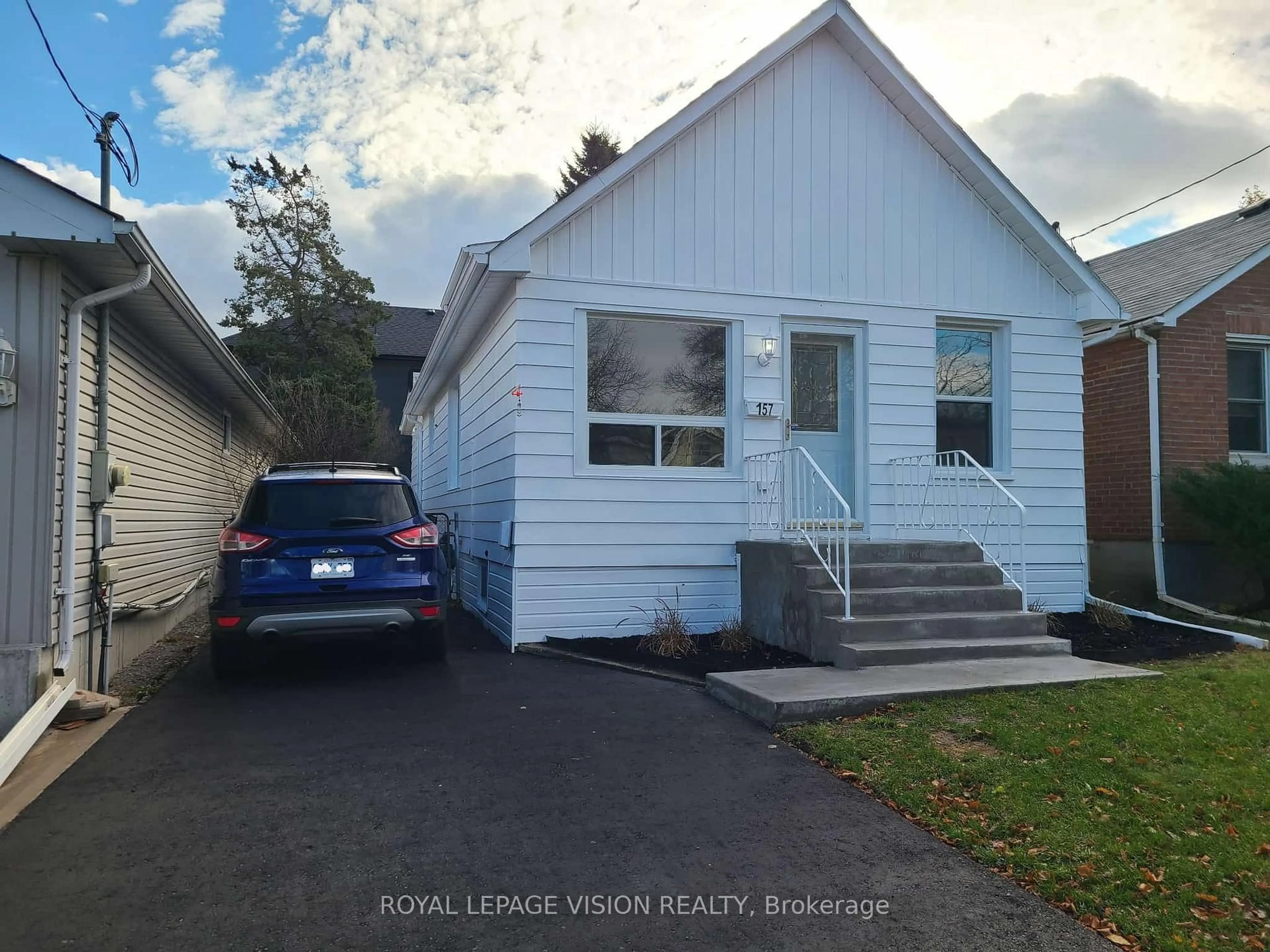 Home with vinyl exterior material, street for 157 College Ave, Oshawa Ontario L1J 1R3