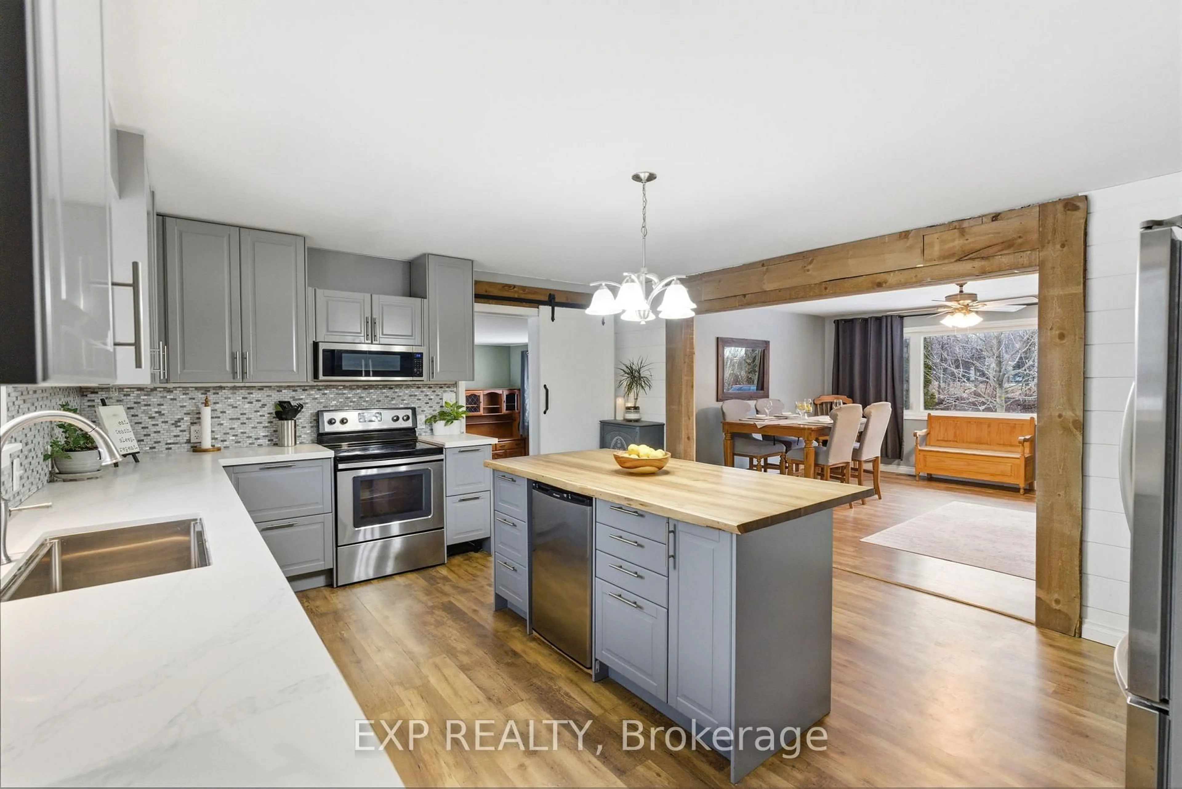 Open concept kitchen, wood/laminate floor for 3824 Trulls Rd, Clarington Ontario L1E 2L3