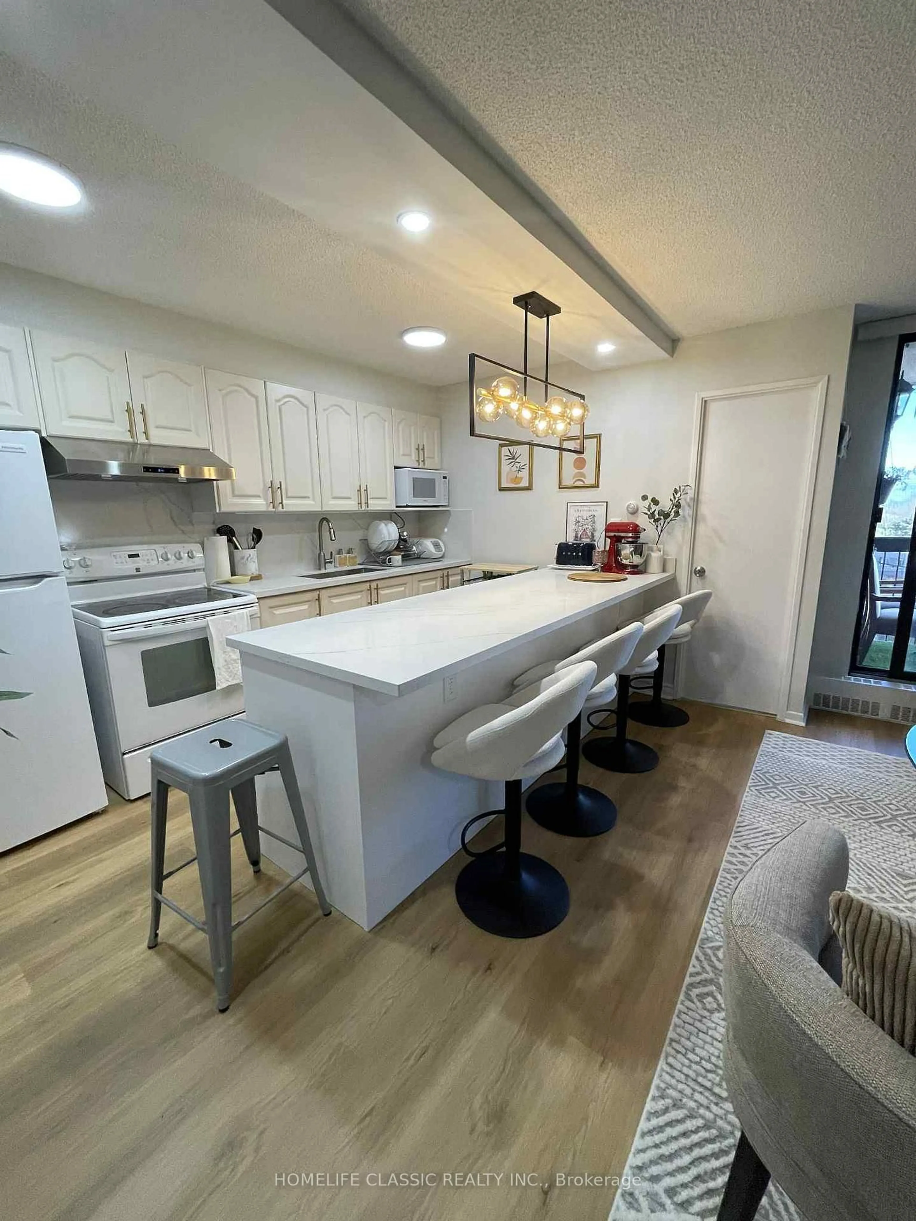 Open concept kitchen, unknown for 90 Ling Rd #603, Toronto Ontario M1E 4Y3