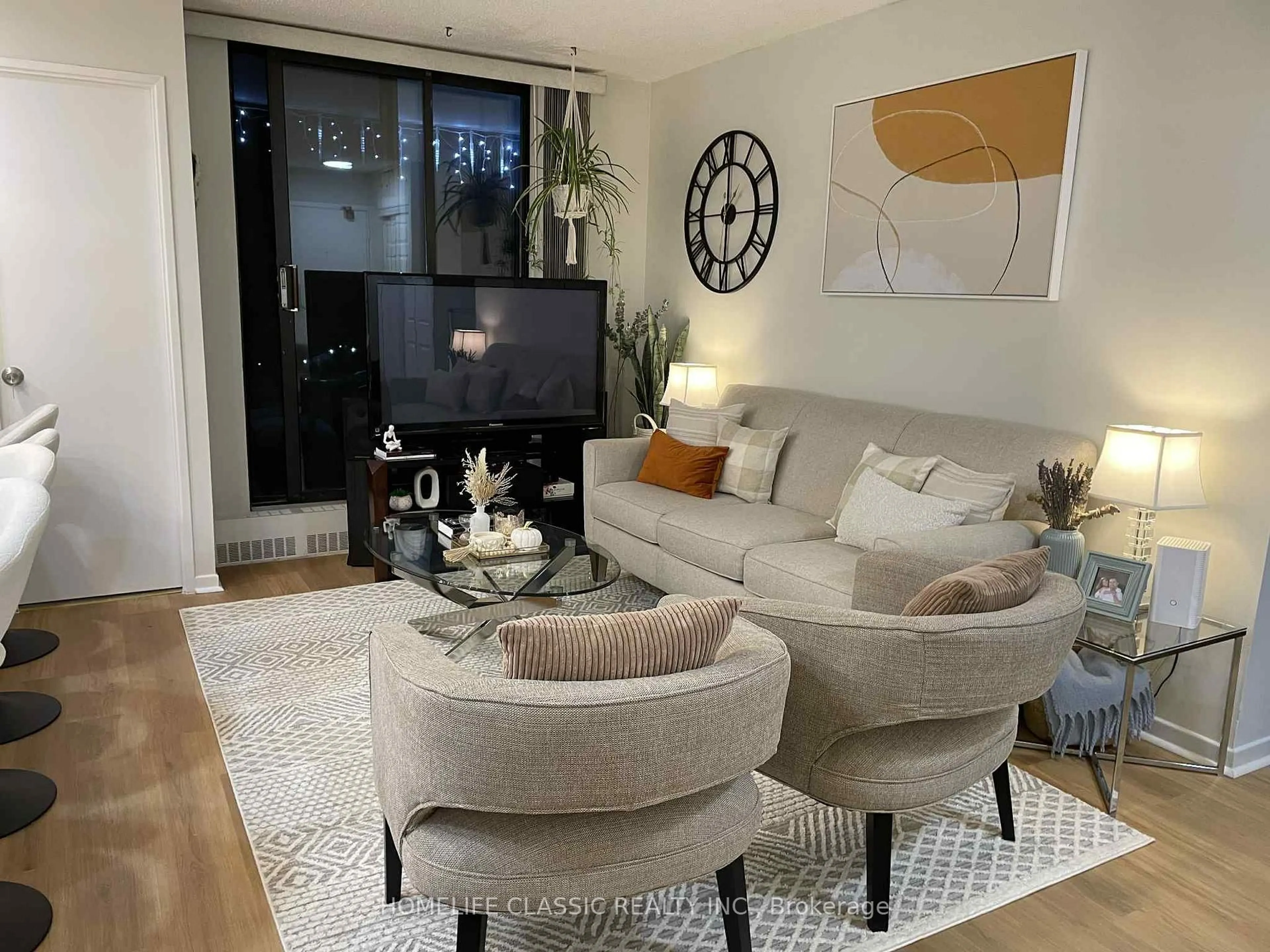 Living room with furniture, unknown for 90 Ling Rd #603, Toronto Ontario M1E 4Y3